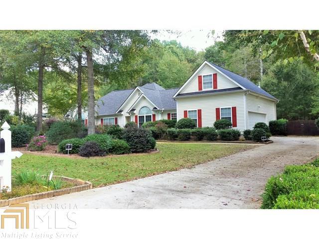 Charming well maintained ranch in desired after Ola school district! This home is warm and inviting with many special features including open floor plan, lots of hardwood, welcoming family room with fireplace, separate dining room, beautiful spacious eat-in kitchen with a finished bonus room over the garage. Stainless steel appliances. Beautifully landscaped with roses galore! Large deck in secluded fenced backyard. All electric except for gas kitchen range and gas fireplace. Roof and A/C system recently updated. Well established neighborhood! Close to shopping, McDonough Townsquare, I-75! Easy to show, call agent first!