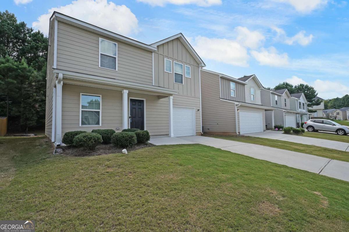 Welcome to this beautifully maintained 4-bedroom, 2.5-bath home built just two years ago. The main level features luxury vinyl flooring throughout, a spacious living room, and a formal dining room that can also serve as a versatile flex space. The kitchen is designed for both style and function with granite countertops, stainless steel appliances, a dine-in area, and a walk-in pantry. Upstairs, you'll find generous bedrooms with plenty of natural light. The exterior offers low-maintenance cement siding and a level backyard, perfect for outdoor enjoyment. With special financing available for qualified buyers at just 1% down, this home combines comfort, convenience, and affordability in one exceptional package.