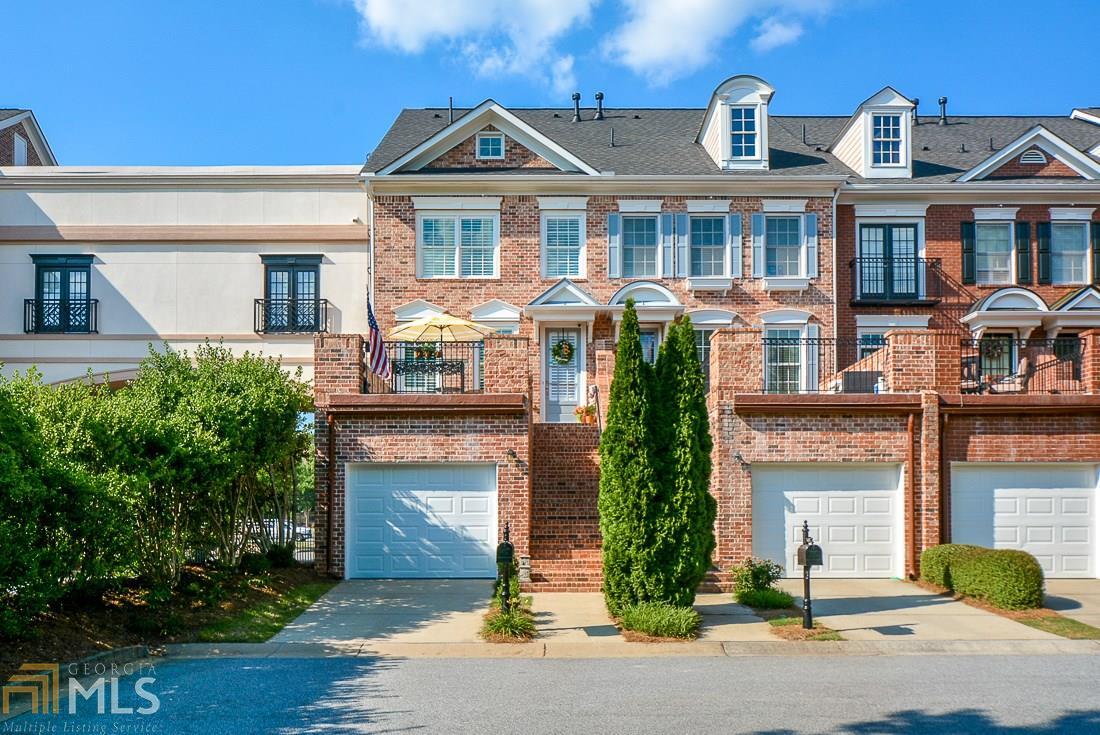 Gorgeous END UNIT Townhome in Roswell - close to shopping and Historic Downtown Roswell. Perfect condition with new paint, appliances, hardwood floors and carpet. Master Suite is spacious and features his and her closets. Outdoors you will find an oversized patio that overlooks Heritage Green. Third bedroom is oversized with desk and built-ins - perfect for an office, media room or teen suite. Gated Community - This John Wieland resale will NOT last!