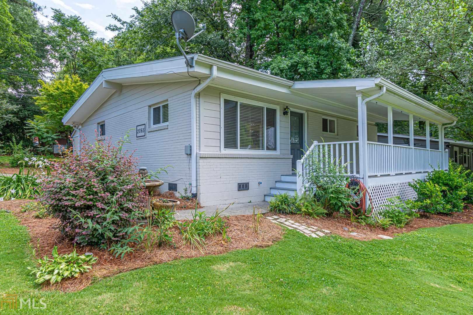 Move in ready. Freshly painted and Updated 3 bedroom 1 bath home ideally situated, minutes from Midtown, Emory and Buckhead. Beltline, and Morningside Nature Preserve accessible by bike path along Lenox road. Relax on the over-sized front porch with a midtown skyline view overlooking a beautifully landscaped yard complete with a waterfall fish pond and bountiful blueberry and blackberry bushes. Vaulted ceilings and solid hardwood floors throughout, tile in kitchen and bath. Granite countertops in kitchen and bath and stainless steel appliances. Newer Samsung Dishwasher. Large capacity stacked Washer and Dryer adjacent to 3 bedrooms. Roof and HVAC replaced one year ago. A detached 16x24 ft two room studio in rear complete with a full bath and deck is perfect for an arts and crafts studio or private office. Corner lot with 3 car driveway off of Ogilvie Dr. New bike lanes on Lenox Road! 2 large sheds in the rear and side of house for extra storage. More pix to be added after 5/8/2020.