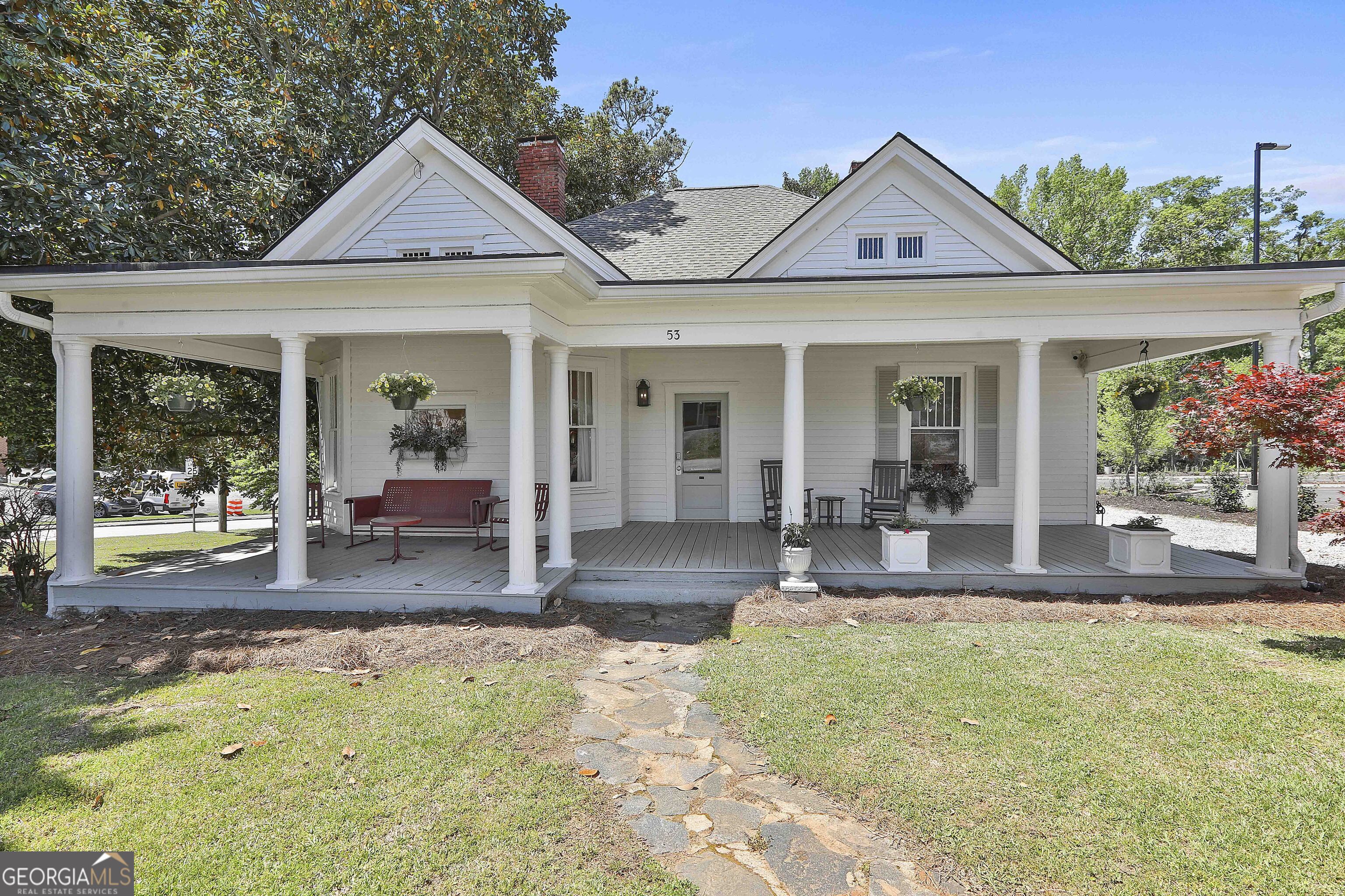 Priced to SELL!!!!! Incredible Opportunity in Charming Downtown Fairburn!!! This large property with almost 400FT of road frontage is perfectly located across the street from the United Community Bank, next door to the new city parking lot, and catty-corner to Hudson Plaza. The property is currently zoned O&I, and the renovated building exudes character. The building boasts 4 separate offices, a kitchen, two bathrooms, and plenty of parking with access to Washington Street and Valley View Drive. The City of Fairburn has also identified this property in their Future Development Map as potentially, a Town Center Mixed-Use area. Lots in Downtown Fairburn are typically small, with zero-lot-line buildings, and shallow or no setbacks from the street right of way. Downtown Fairburn is easily accessible from 1-85 and the centralized location of Downtown Fairburn is ideal for denser town center mixed-use development patterns, with residential, commercial, civic/institutional/office, and educational uses within the character area. Schedule your viewing today and don't miss out on this incredible opportunity in Downtown Fairburn!