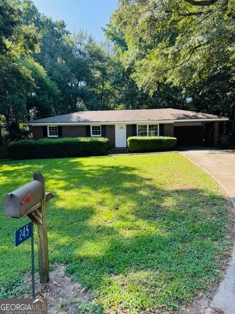 Photo of 245 Bruce Street, Loganville, GA 30052 (MLS # 10827774)