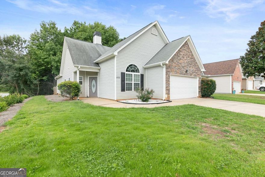 Discover the perfect blend of comfort and style at 502 Huterian Place, a beautifully updated ranch home in the highly sought-after Summergrove neighborhood of Newnan, Georgia. With 3 bedrooms and 2 full baths, this turnkey residence welcomes you with fresh interior paint throughout, including newly painted kitchen cabinets, and a light-filled family room where vaulted ceilings and a cozy fireplace create an inviting place to gather.    The heart of the home is the thoughtfully renovated kitchen, featuring stainless steel appliances, gleaming quartz countertops, plentiful cabinetry, and a breakfast bar that's perfect for enjoying morning coffee or sharing casual meals with loved ones.    Your owner's suite offers a peaceful retreat, complete with an updated bath boasting a modern dual vanity, frameless glass shower, and rich tile accents. Two additional bedrooms share a refreshed guest bath, ensuring every guest feels right at home.    Step outside to a quaint, fenced backyard and a spacious corner-lot patio, ideal for weekend barbecues, quiet afternoons with a book, or simply soaking up the Georgia sunshine.    Living in Summergrove means enjoying resort-style amenities, including two sparkling pools, tennis courts, scenic lakes, playgrounds, parks, and miles of walking trails. Just minutes away, you'll find the vibrant shopping and dining of Ashley Park, the charm of historic downtown Newnan's boutiques and restaurants, and outdoor fun at Carl Miller Park and the McRitchie-Hollis Museum.    This is more than a house-it's a place to feel at home. Schedule your private tour today.