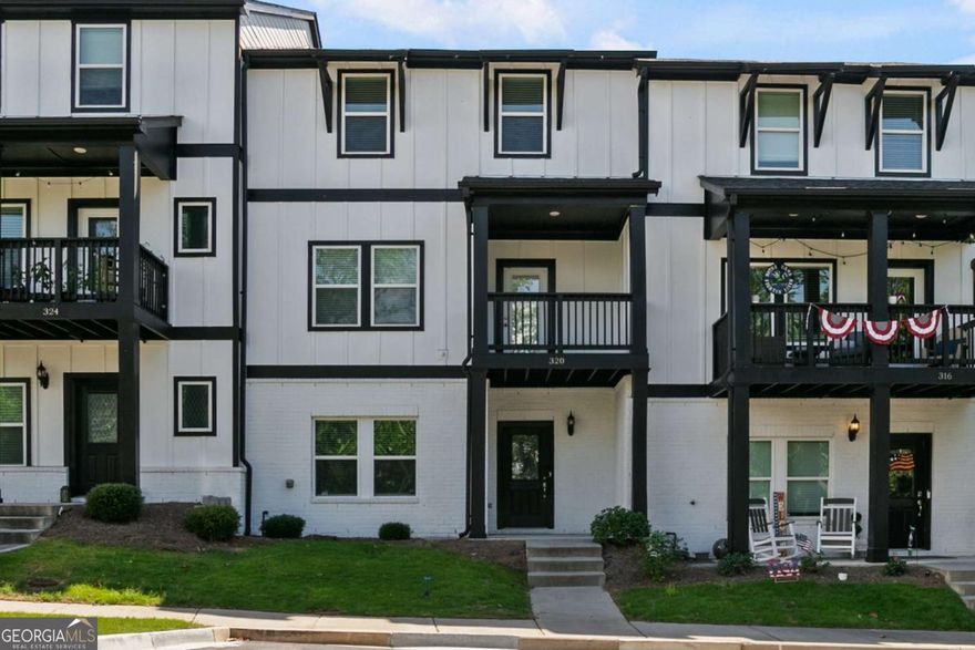 Seller offering buyer INCENTIVE, with acceptable offer: refrigerator, washer and dryer to stay with sale of home. Also, seller offering a buyer loan rate buy down. Don't wait for rates to decrease, get in now at a lower rate. Gorgeous townhome in the perfect location! Close to shopping, dining, walking trails, downtown Woodstock and 575. This townhome features 3 stories, entering into the lower level featuring a bedroom, full bathroom and 2 car garage with opener. Heading upstairs to the main level, you'll find an open, spacious floorplan with luxury vinyl plank flooring throughout. The kitchen features a large island, light grey cabinetry, beautiful backsplash, large pantry and stainless appliances including double ovens, microwave, gas cooktop and dishwasher. The kitchen is flanked by the great room and dining room. The main level also features a half bath and closet. There is a covered front deck off the dining area. Heading upstairs, you'll find three bedrooms, including the owner's suite with large closet. The owner's bath has an oversized, tiled shower and double vanities. There are two secondary bedrooms and a full bath with double vanity and tub/shower. The laundry room is also on the upper level. Window treatments throughout home and move-in ready. Enjoy easy living in this energy efficient townhome and relax by the community pool.