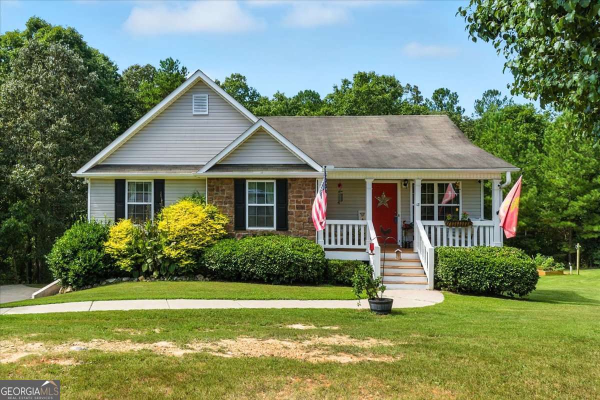 Welcome to country living with plenty of charm! This raised ranch in Adairsville sits on a peaceful 1.47-acre cul-de-sac lot, offering room to spread out and enjoy the outdoors. The property features a spacious yard perfect for gardening, hobbies, or simply soaking up the quiet surroundings-and it even comes ready for chickens, making it ideal for those dreaming of a small homestead lifestyle. Inside, the home offers the convenience of a raised ranch layout with comfortable living spaces and a cozy kitchen with white cabinets and stainless steel appliances. LVP flooring is featured throughout the home (no carpet anywhere!). The basement has plenty of room for storage, a workshop, or you could finish it for extra living space. If you've been looking for a home with land, character, and a touch of farm life, this Adairsville property is the perfect fit!