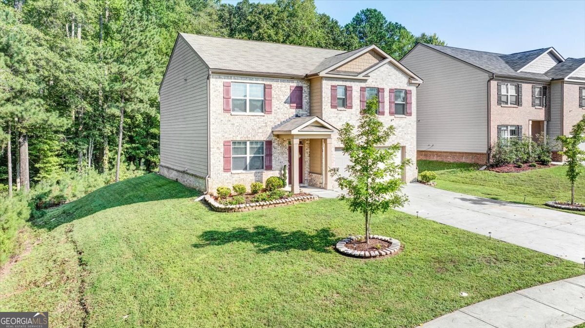 Welcome to 1235 River Oak Ln - where space, style, and Southern charm come together in Loganville's most sought-after neighborhood. Be the second owner ever of this beautiful maintained 5-bedroom, 3-bath home sitting on a generous, private lot. The home offers the perfect blend of comfort and functionality. Step inside to find a sunlit, open-concept layout and tasteful upgrades throughout. The spacious kitchen features granite countertops, stainless steel appliances, and a large island perfect for entertaining. Upstairs, the oversized primary suite boasts a spa-like bath and ample closet space. Enjoy quiet mornings or summer gatherings in the oversized backyard. Located in a friendly, well-established community with easy access to top-rated schools - this home is the ideal retreat for southern living. Don't miss your chance to call this Loganville gem home.