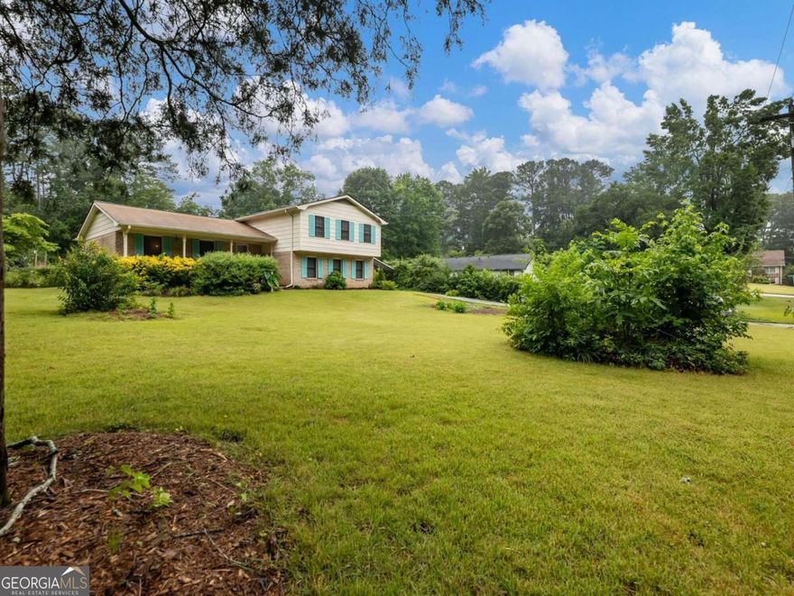 ****OPEN HOUSE TODAY FROM 1:00 TO 3:00    This home offers the perfect blend of country living with city convenience. Inside, you'll find cozy living spaces, a cheerful kitchen, and a spacious front living room. The step-down family room features a beautiful fireplace, adding to the home's charm. The backyard is a true oasis, boasting a greenhouse, a productive garden, fruit trees, and even a chicken coop with three chickens. Situated on a large lot, this home is conveniently close to dining, shopping, beautiful parks, and medical facilities, and is located within a highly sought-after school district.