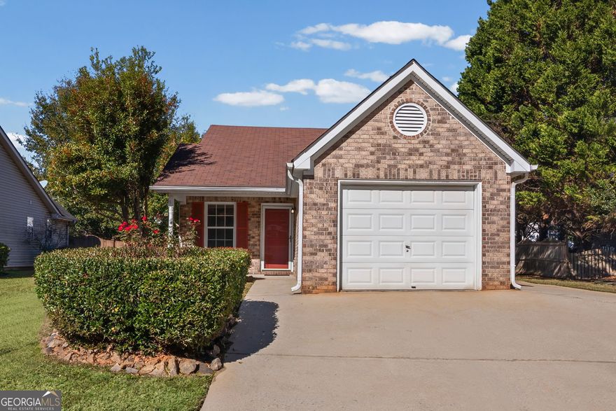 2 BR/2BA RANCH HOME CONVENIENTLY LOCATED IN NEWNAN With Easy Access To Ashley Park, City Of Hope, Piedmont Hospital And I-85. The home was recently renovated with new flooring, new fixtures, renovated bathrooms and fresh paint. Living area with fireplace and built in bookcases. Dining area. Kitchen has breakfast bar, range/oven, dishwasher, refrigerator. Laundry room with washer and dryer, pantry. Second bedroom has its own side entrance. Roomy primary bedroom with a walk-in closet and stepless shower. Fenced backyard with raised garden beds and shop. Low-maintenance property. Priced under recent appraisal!