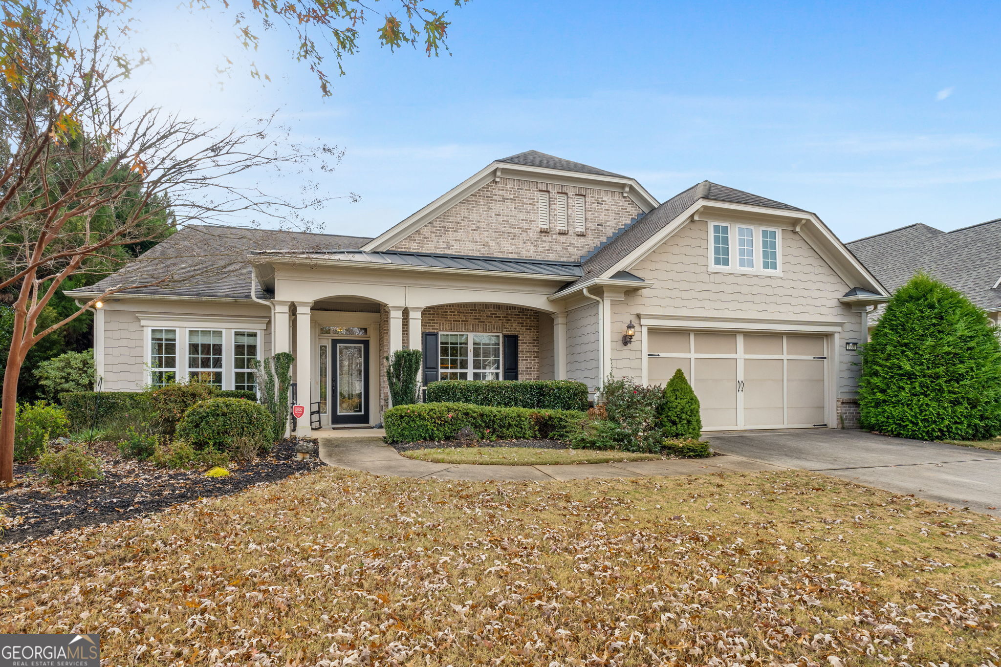 Welcome to Morningside Lane! The largest single story home built in Sun City. Once inside the foyer you will enjoy your own library with custom cabinets and even a rolling ladder. Across from library is the dining room big enough to seat 12. This home is an entertainers delight, with large kitchen lighted glass cabinets, copper sink and even has a butlers pantry in addition to the very large pantry. Fireplace with built in cabinets, sunroom and a gorgeous covered patio across the back. The master bedroom is spacious and inviting, huge bath with shower and walk in closet. On the other side are two bedrooms with with ensuites and a large laundry room. All light fixtures are updated as well as new hardwood floors 2021. The garage has a lift system for storage in the attic. If that's not enough the yard is a beautifully landscaped corner lot.