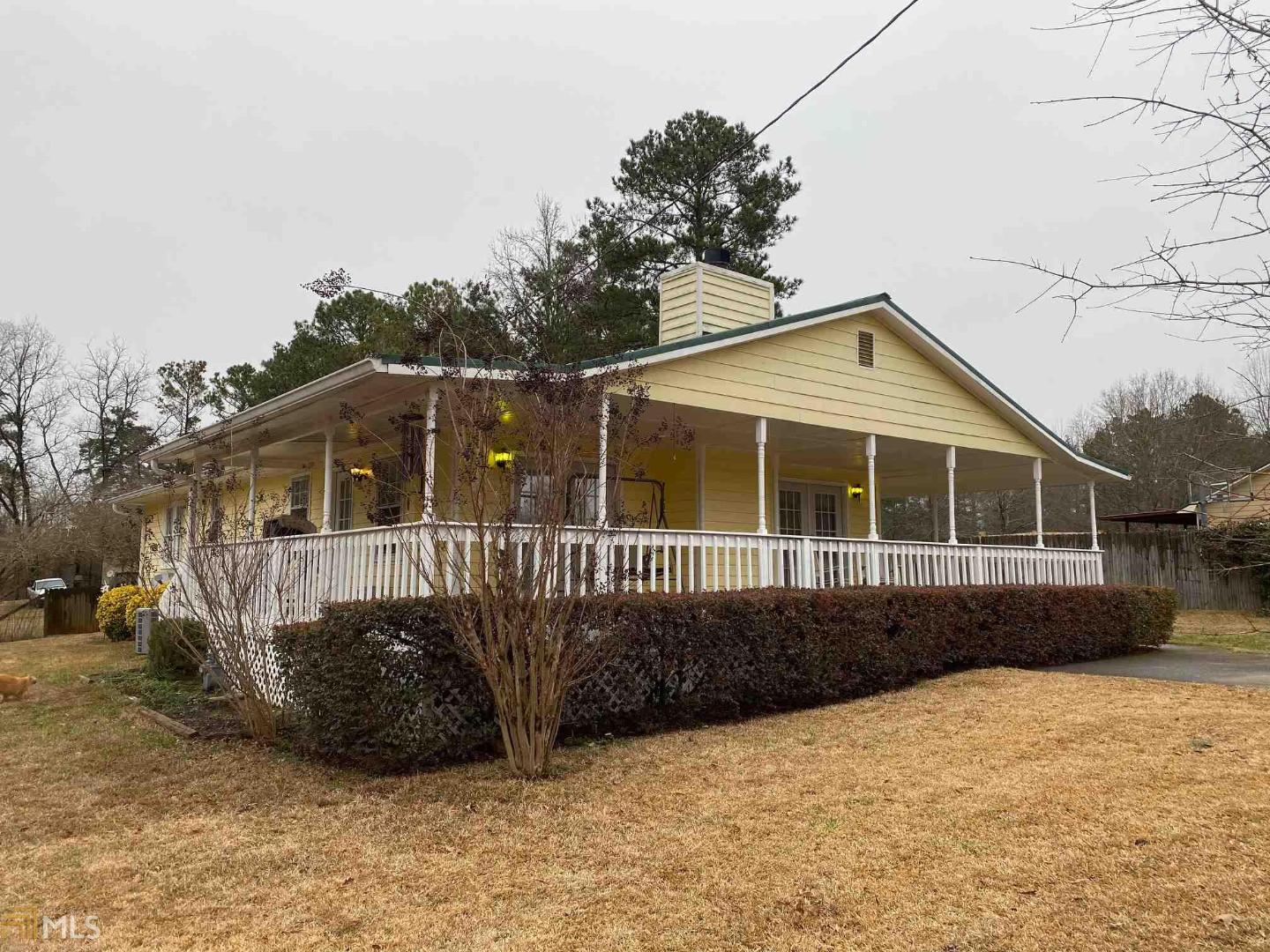 This one won't last long! Wonderful one level cottage style home with wrap around porch in convenient Carroll County location. One plus acres, fenced back yard with 24 x 30 ft. metal building. Home features an open living plan with three bedrooms and two full baths. Laundry room in kitchen. Many upgrades include metal roof, new hardwood lament flooring, carpet and much more. Some furnishings may be included with sale.