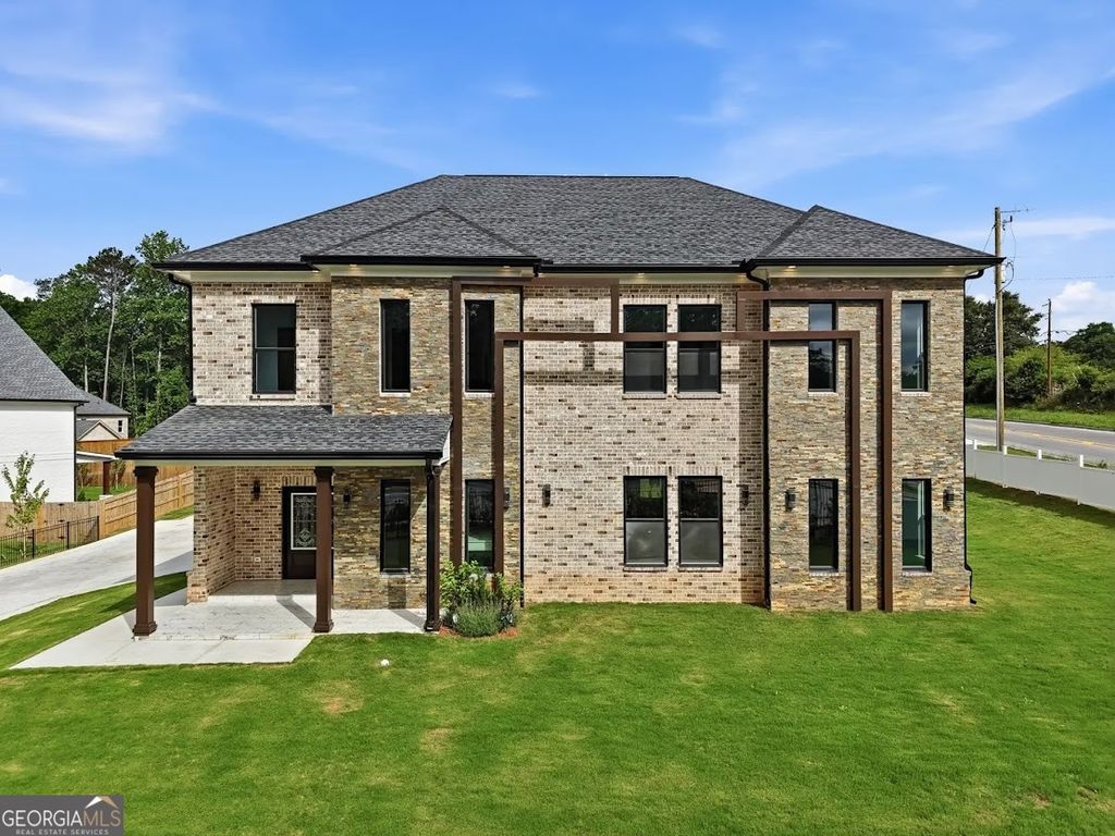 Photo of 1515 Grayson Parkway, Grayson, GA 30017 (MLS # 10776346)