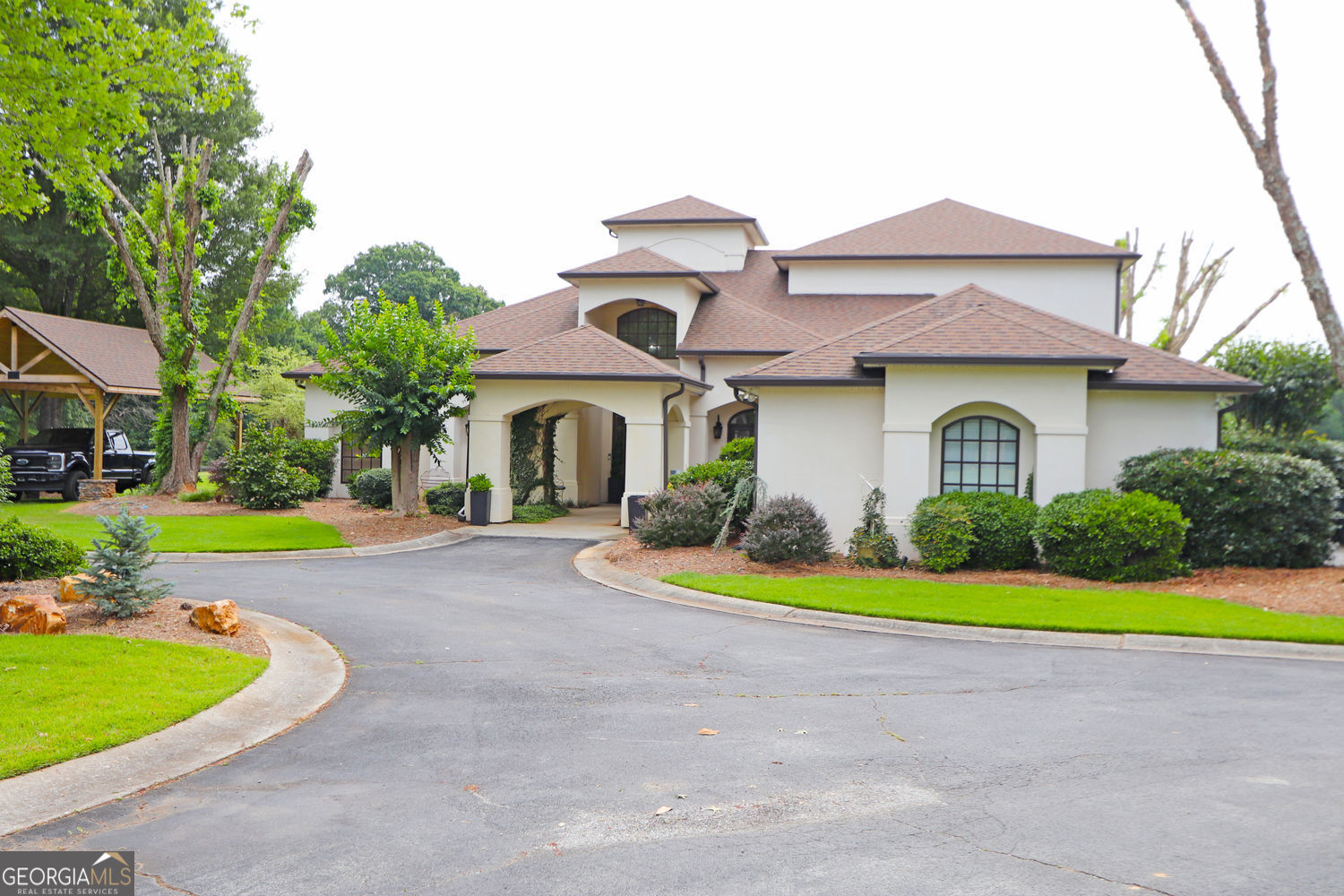 This is the one you are looking for! Your own taste of paradise! This 5 Bedroom/3.5 Bathroom Mediterranean Mansion boasts so much it can't all be put in this description. But here goes! This Astonishing Home boasts: Gated Entry, 3-Car Garage, Brand New Parking Pavilion, Barn with Loft, Electricity & Water, Tranquil Pond, Large Veranda opened to Saltwater Pool, Cabana, & Hot Tub and providing Access to Master, Dining, & Bath, Balcony overlooking Breathtaking Backyard, The Kitchen will leave you speechless w/ Exterior vented Vents, Island w/ reach-in cooler, Large Walk-in Pantry, Custom Paneled SubZero Refrigerator, Commercial Grade Range/Double Oven, Concrete, Granite, & Solid Surface Countertops Throughout, Tile & Hardwood Floors Throughout, 8 Foot Interior Doors Throughout, Master Suite on Main & Additional Upstairs Master Suite, Laundry/Mud Room, Amazing Walk-In Closets w/ Built-In Cabinets, Master Bathroom with Separate Tub & Duel Nozzle Tiled Shower, Sound Proof Bonus Room, Exercise/Library Room, Large Dining Room w Built-in China Cabinet/Buffet, Large Breakfast Area, Elegant & Tranquil Family/Great Room w/ Fireplace, Tankless Water Heater, 3 HVAC (Duel Fuel) Systems, Inground Trampoline, on 3.04 Acres, and more...