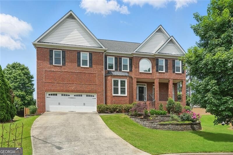 Stunning 5-bedroom/ 5.5-bathroom home in top ranked STEM school district! Murdock, Hightower, POPE High School. Prime CULDESAC location with Level & Fenced Backyard. Open Floorplan featuring white oak hardwood floors thru-out the Main Floor. Hard to find Guest Suite with Full Bath located on the Main Level. Updated kitchen with center island opens to Two Story Family Room with Gas Fireplace. Separate Den off Family Room & Banquet Sized Dining Room complete the Main Level. Upstairs has 3 bedrooms each with their own private bathroom, a laundry room, & oversized master with a large sitting room, full 5-piece ensuite & walk-in closet with custom shelving system. Fully FINISHED daylight BASEMENT with RecRoom, Bedroom, Full Bath, Bonus Room, & workshop. Enjoy the front porch or the huge fully FENCED BACKYARD with SCREENED PORCH and large deck. This turnkey home offers Low E Argon gas filled double and triple pane Windows, Roof replaced in 2014, HVAC replaced in 2024. Sought after Kings Farm Nbrhood with Clubhouse, Playground, Swim & Tennis.