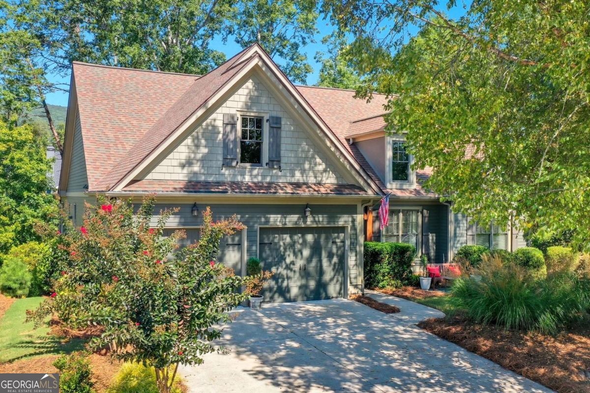 Custom Bulit Craftsman Ranch Over a Full Walk-out Terrace Level on Beautiful Cul-de-Sac Lot. Immaculately Maintained Home. Easy One Level Living. This Well Designed Open Concept Floorplan Flows Seemlessly From the Spacious Entry into the Sizable Great Room with Sweeping Cathedral Ceiling, Stone Fireplace with Gas Logs and Views to the Dining Area and Kitchen. Beautiful Warm Stained Cabinetry Grounds the Kitchen and Offers Tons of Storage Space. The Kitchen Island with Breakfast Bar is Ideal for Quick On-the-Go Meals. The Keeping Rooms Offers a Comfortable Space for Others to Relax and Socialize with the Cook! Just Off the Kitchen is a Walk-in Pantry, Laundry Room, Mud Room and Half Bath! Two Ample Sized Guest Rooms with a Shared Bathroom Provide the Space Needed for Ovenight Lake Guests or Family. The Primary Suite Functions as a Personal Retreat for Rest and Relaxtion Leading to the Primary En Suite with Double Vanity, Separate Tub and Shower and Ample Sized Walk-in Closet. There is an Open Stairwell with Beautiful Craftsman Style Railing that Leads to a Fabulous Finished Walk-out Terrace Level. The Immense Terrace Offers Space to Host Movie Night or Game Day Watch Parties! Two Spacious Guest Rooms and Full Bath Ensure Privacy and Convenience for Guests or Family. The Spacious Dedicated Home Office Makes it Easy to Work Remotely. Fantastic Craft Room Provides Space for Your Imaginative Projects and Creativity. Additionally, There is a Home Gym and Work Shop! Endless Storage Space for Christmas Decor and Much More. Low Maintence Landscaping. Private Recessed Covered Deck Offers Endless Hours to Relax or Entertain Loved Ones While Enjoying Lake Arrowhead's Abundant Wildlife. Covered Patio Off the Terrace Level is Ideal for Grilling and Hosting Cookouts! Schedule Your Showing Today and Start Imaging the Memories to be Made Here! Gated Lake and Golf Community with 24 Hour Security. Fantastic Amenities. 1 Hour North of Atlanta.