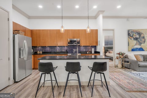 Photo of 711 Cosmopolitan Drive NE #150, Atlanta, GA 30324 (MLS # 10836233)