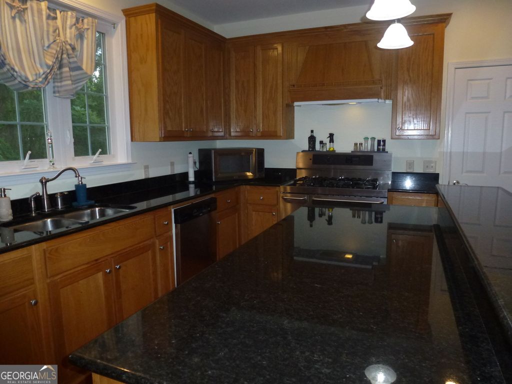Photo of 185 Sir Edward Teach Road, Midway, GA 31320 (MLS # 10798345)