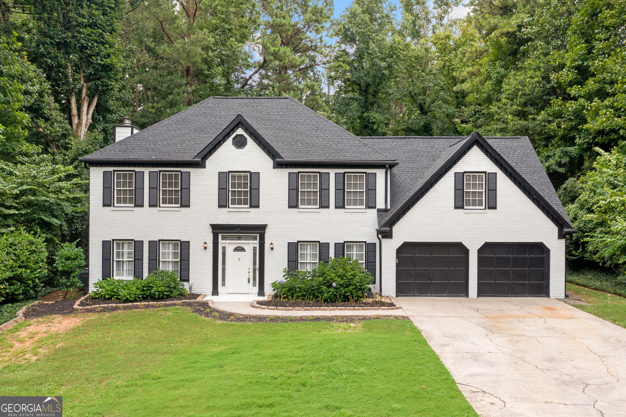 Step into charm, comfort, and convenience with this recently remodeled beautiful new listing minutes from downtown Roswell, Georgia! Perfectly nestled in a well-established neighborhood, this 5-bedroom 2.5 bath home blends timeless style with modern updates, creating a space that feels both fresh and familiar. From the moment you arrive, you'll notice the inviting curb appeal and lush, landscaped yard. Inside, enjoy a bright and warm floor plan filled with natural light-perfect for entertaining or simply relaxing at home. The spacious kitchen features sleek countertops, quality cabinetry, and updated appliances, all flowing effortlessly into a cozy living area with built-ins and a warm fireplace. Whether you're hosting dinner parties, working from your dedicated home office, or unwinding in the serene backyard, this home offers the perfect balance of function and beauty. Top it off with spacious bedrooms, spa-inspired bathrooms, and plenty of storage. Located just minutes from historic downtown Roswell, award-winning schools, parks, shopping, and dining-this home offers the lifestyle you've been looking for. Don't miss your chance to make it yours! Let's set a time to see it!!
