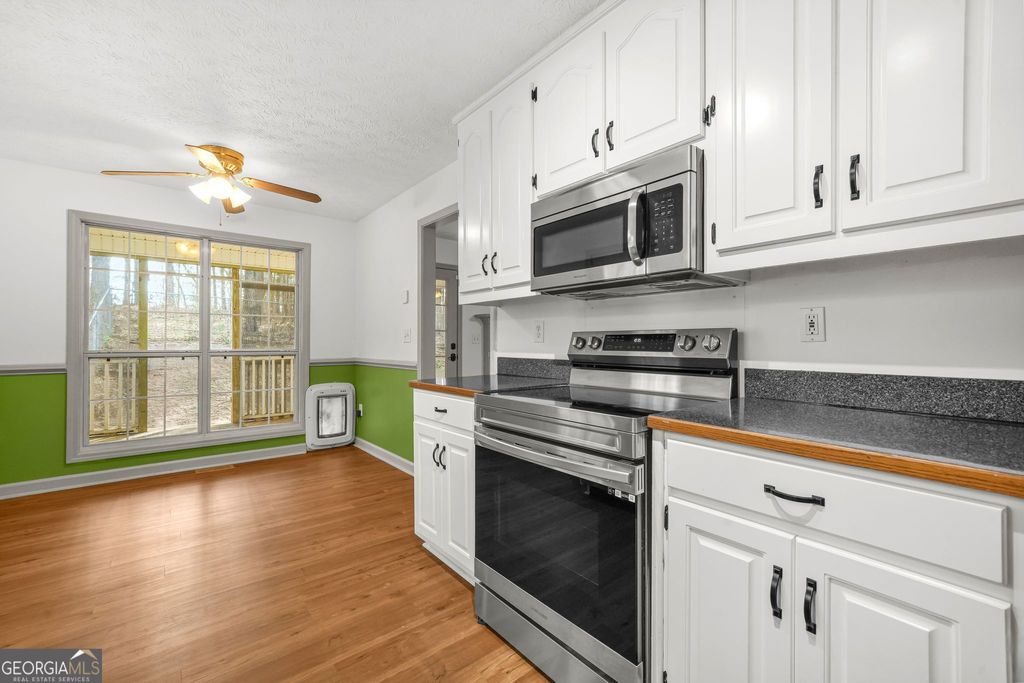 Photo of 156 Pine Street, Covington, GA 30014 (MLS # 10710395)