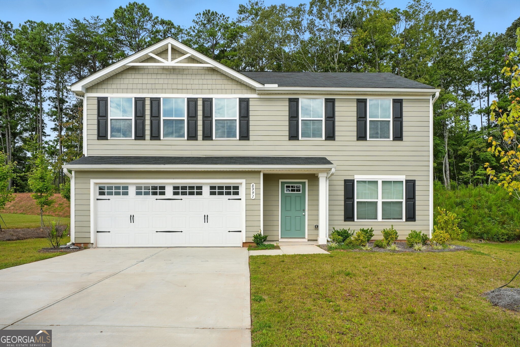 Built in 2024, this stunning 4-bedroom, 2.5-bath home offers modern comfort and style. The open-concept layout features a spacious main level with a versatile flex room, perfect for an office or playroom. The kitchen is beautifully appointed with stained cabinets, granite countertops, and overlooks the dining and living areas. Durable HardiePlank siding, a slab foundation, and a level yard provide low-maintenance living. Don't miss this opportunity to own a like-new home with thoughtful details throughout