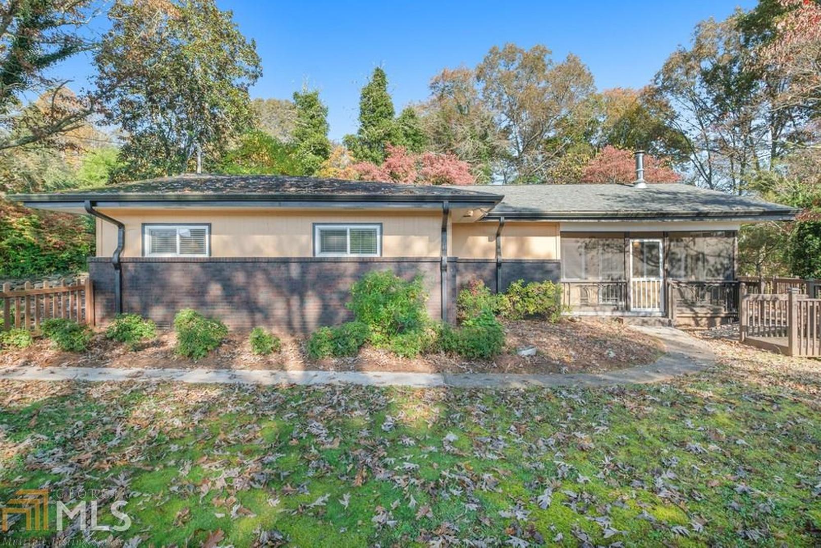 Pristine 1960's charm with modern update in a quiet, safe, friendly neighborhood close to the trendy restaurants and shops in the newly designed city of McCaysville, GA. Home has open floor plan that is energy efficient, large master with walk-in closet, extra large living room with wood stove and plenty of windows, modern kitchen with seasonal mountain view, dining area, separate spacious laundry room, screened porch, large deck, handy carport. Fenced in large back and side yard with plenty of room for gardening and pets. Property abounds with mature trees; Dogwood, Azalea and Rhododendron and a magnificent large oak tree in front yard. Charming rock wall lines the paved driveway as you enter the property. Bonus roomy finished basement with space for storage or would make a great workshop. Close to the conveniences of town and nearby Horseshoe Bend Park. A wonderful place to call home.