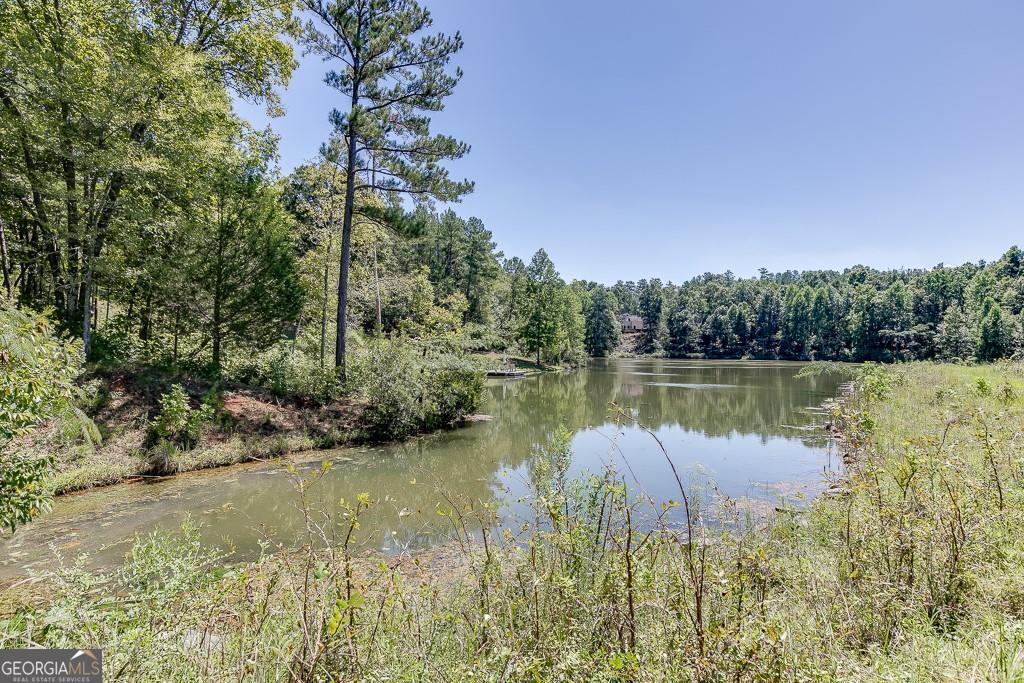 Here's something you don't want to miss- USDA eligible 0% down for qualified buyers!! With this community, your privacy is protected like gold. You won't have to worry about your neighbor selling out to a big company or waking up to a corporate eyesore next door. Here, the community is dedicated to maintaining the quiet, private lifestyle you've been searching for-so you can truly relax and enjoy your slice of paradise.