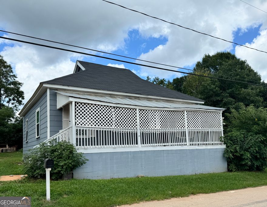 Situated minutes away from downtown Griffin, offering easy access to shops, restaurants, and local attractions. Don't miss out on this great opportunity to call this place home!    Cute 2-bed 1-bath minutes away from downtown Griffin, offering easy access to shops, restaurants, and local attractions. The property features a spacious floor plan with plenty of room, a long covered front porch, 2 rear porches, lots of windows, eat in kitchen w/ range & refrigerator and a laundry closet.