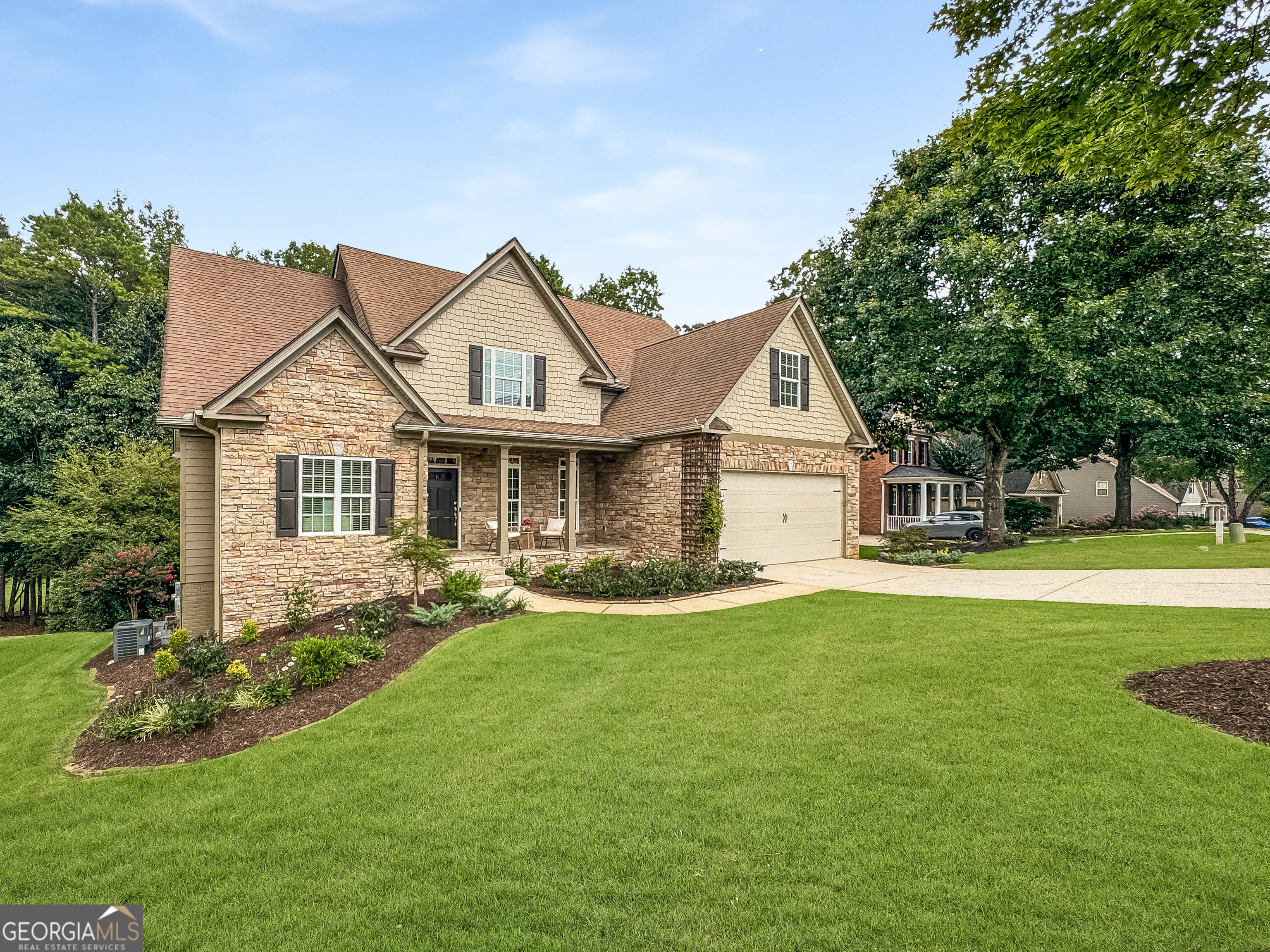 NEW LISTING OPEN HOUSE(s) THIS SATURDAY September 20th from 2-5pm AND AUTUMN NIGHTS Next Wednesday Sept 24th 6-8pm, Come Take a Look| INCREDIBLE GOLF COURSE HOME in SUMMERGROVE / NEWNAN -- Summergrove is a Highly Desirable Golf Community in Newnan with Unmatched Amenities -- Beautifully Detailed Lichty Brothers Built Home in Excellent Condition -- 2 Story Home on Partially Finished Basement -- Beautiful Landscaping + Irrigation System -- Two Level Backyard Areas PLUS Hardscape Patio & "Fire Pit" Area -- Walk Out To Lower Patio Through Backyard And Down To The Golf Course -- 4 Bedrooms / 3.5 Baths, ~ 4,000 Finished Sq Ft + 525 Sq Ft Unfinished in Basement (Stubbed for Bath) -- Beautiful Stacked Stone Exterior + Concrete Siding -- Custom Detail Throughout Featuring REAL Site Finished Hardwood Floors on ENTIRE Main Floor Except Primary Bedroom, Ceramic Tile Flooring in ALL Bathrooms & Laundry, Main Floor Transom Windows Allows Lots of Natural Light, Wainscotting & Crown Molding Everywhere -- Great Floor Plan Features Primary Suite ON MAIN LEVEL + Large Sitting Area, Dual Vanities, Ceramic Tile Floors, Separate Shower, Garden Tub, And Large Walk-In Closet -- Formal Dining Room With Detailed Wainscoting -- Family Room Enjoys Wall of Windows + Gas Fireplace -- Bright, Open Kitchen With Lots of Cabinets + Walk-In Pantry, Granite Countertops, Hardwood Floors, Breakfast Bar, and Large Breakfast Area That Opens to Screened Porch -- Upstairs Includes 3 More Bedrooms (ALL have Walk-In Closets), 2 Additional Bathrooms (One En Suite Private Bath), Plus Loft Area -- Finished Terrace Level With ~1200 Sq Ft Rec Room, Built In TV & Media, Workshop, And Still Tons of Storage -- Don't Forget About Summer Grove's Unmatched Amenities Including 3 Pools and Sharks Swim Team, Eastlake Amenity Area Enjoys Lazy River, Tapestry Amenity Area Has Zero Entry Pool + All Purpose Ballfield, Main Amenity Area Has Community Clubhouse, Largest of the 3 Pools, 8 Lighted Tennis / Pickleball Courts and ALTA Tennis Team, 18 Hole Golf Course, Dozens of Parks And Playgrounds, Beach Volleyball Court, 100 Ac Lake For Fishing / Boating, Miles of Sidewalks and NOW The LINC ALL Purpose Path That Connects Summergrove to Ashley Park and Downtown Newnan! -- THIS IS A MUST SEE!