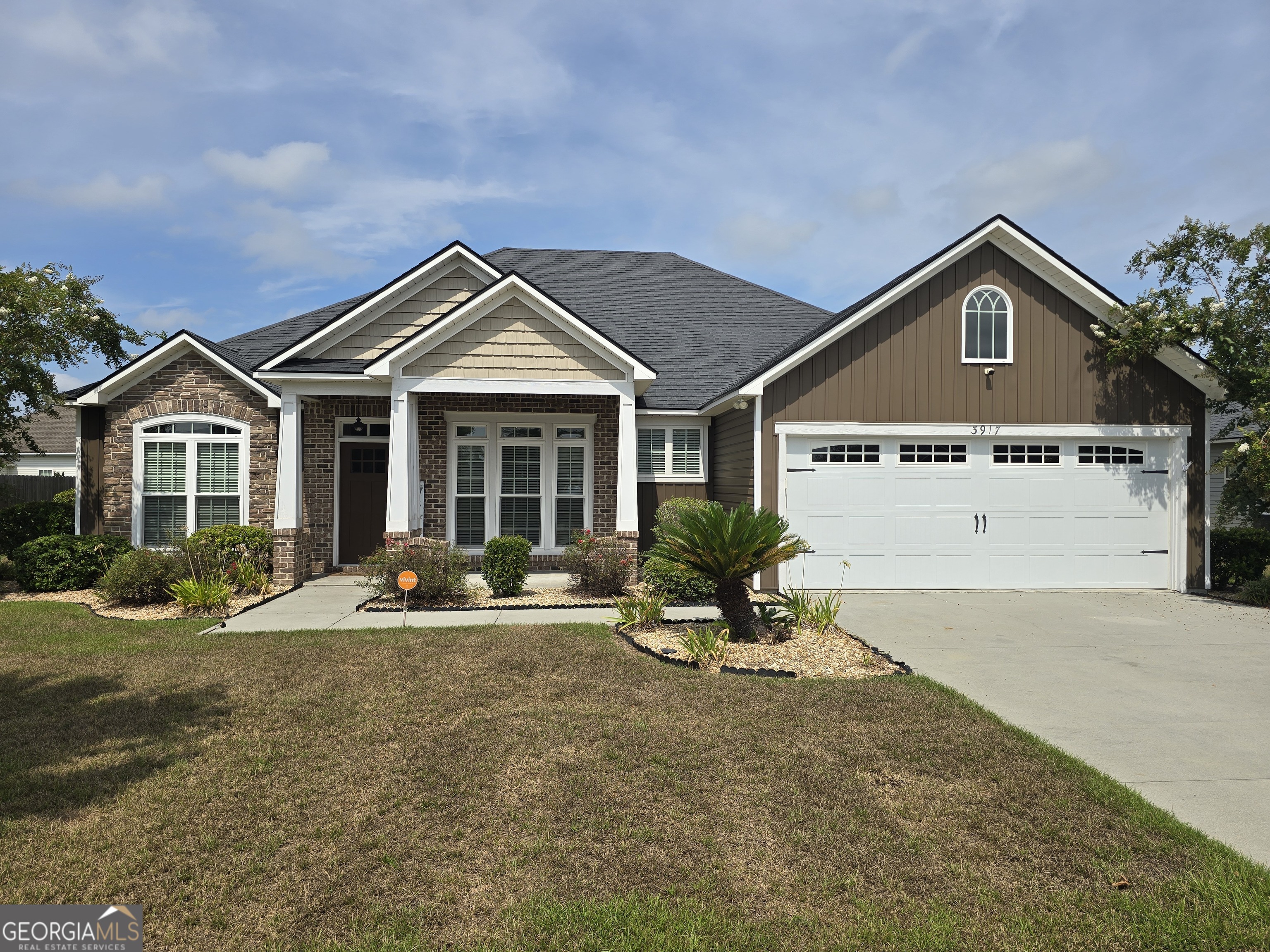 This beautifully upgraded 4BR/3BA home offers 2,388 sq ft of comfortable living with a thoughtful split floor plan and stylish finishes throughout. From the coffered ceilings in the great room, dining room, and master bedroom to the stacked crown molding and 8-foot interior doors, every detail adds a touch of elegance. The kitchen is both functional and inviting with granite countertops, under-cabinet lighting, double wall ovens, and a cozy breakfast nook. The spacious master suite features a stunning walk-in closet with custom shelving, an island with built-in drawers and outlets, and a luxurious bath with soaking tub, tiled shower, and executive-height vanities. Two guest bedrooms share a well-appointed hall bath, while a separate bedroom with its own private bath offers ideal space for guests or a home office. A sunroom at the rear of the home opens to a patio with pergola-perfect for relaxing or entertaining. Located just minutes from Moody AFB, this home blends modern upgrades with timeless charm.