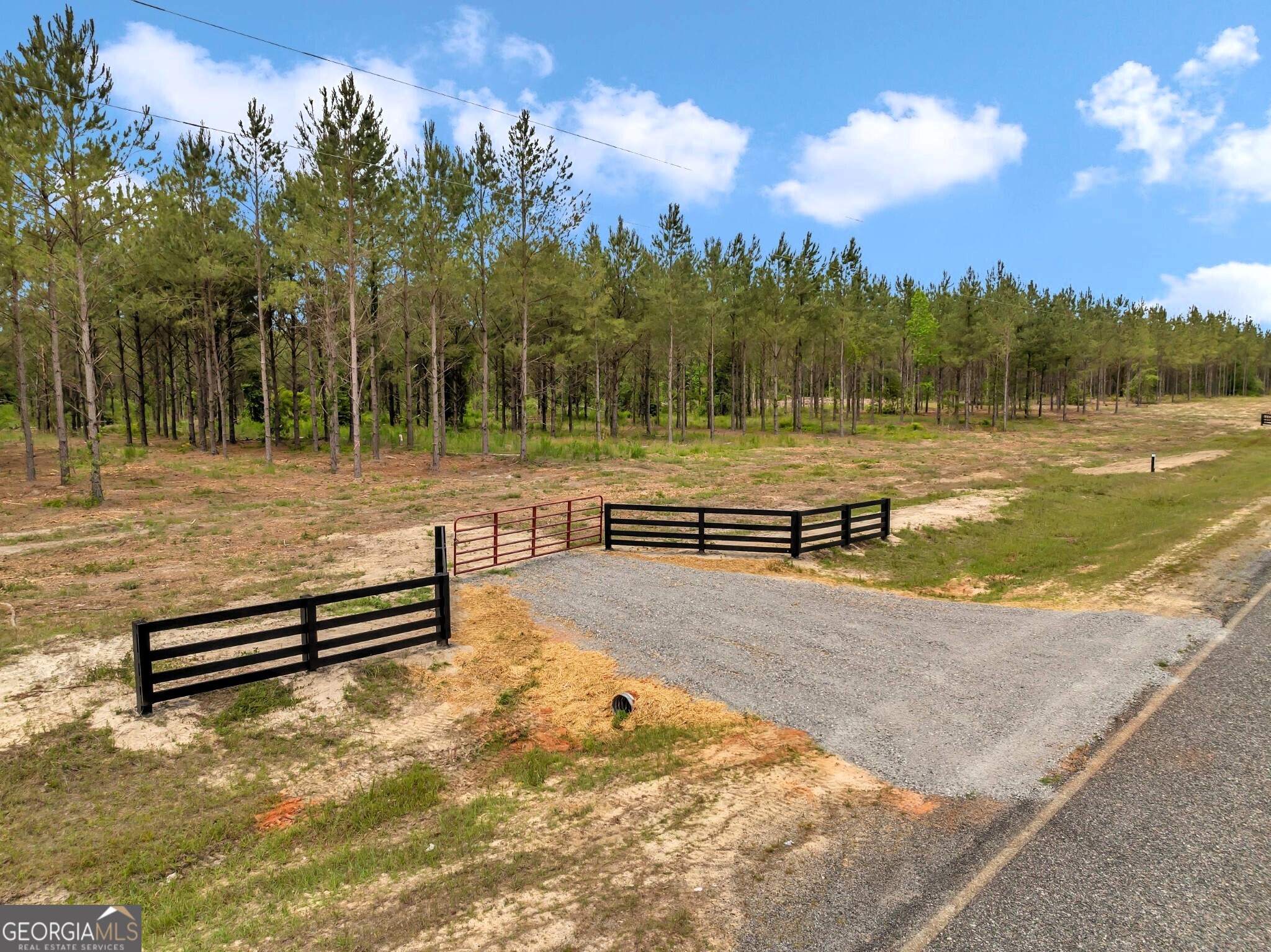 Bluewater offers 19 beautiful country homesites designed for peaceful living in a natural setting. Lot #6 features 7.389 wooded acres with a small creek along the back property line, creating a private and serene retreat where nature abounds. This gated community includes protective covenants, paved road frontage, and access to an excellent public school district. Conveniently located just minutes from downtown Dublin and only 6 minutes from Interstate 16, Bluewater sits halfway between Atlanta and Savannah, offering both charm and convenience. With nearby shopping, dining, entertainment, and a thriving local economy, this is an excellent place to build your dream home, raise a family, and enjoy the laidback country lifestyle.