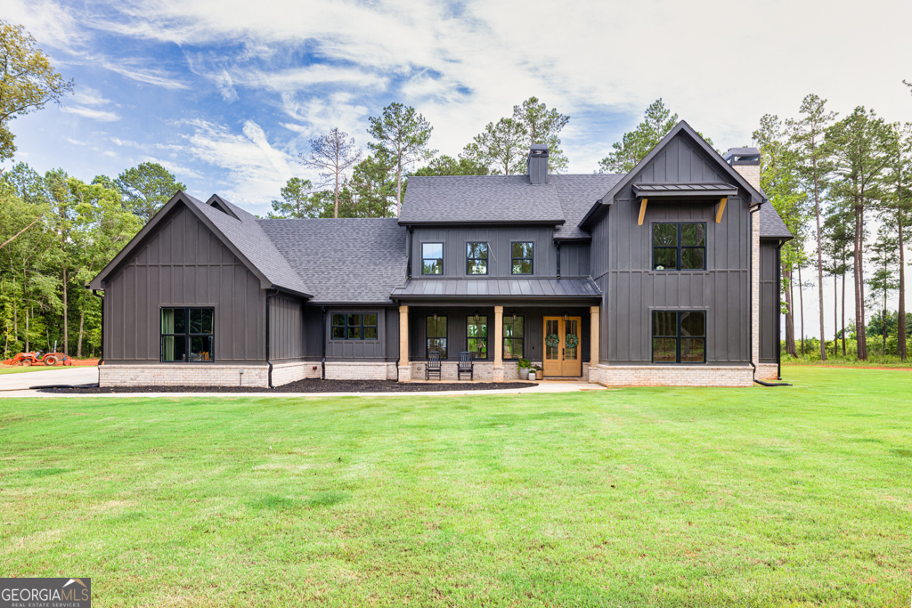 Welcome to 270 Indian Creek, located in Good Hope Georgia. This home offers everything you could want in a modern farmhouse. The first feature you will notice as you step in the double front doors will be the never ending ceilings and the stone fireplace that runs from floor to ceiling! This home has been intentionally crafted with custom touches all throughout the home that add character and texture to every room. From the grand living room you will enter the kitchen with a massive island that is covered in beautiful quartz counter tops with all stainless steel Thermador appliances. The master bedroom is on the main with a bathroom that has a walk-in shower and free standing tub, that will help you wind down after a long day. It sits comfortably on approximately 32 acres and has a beautiful creek that runs along the middle of the property. It is truly a serene retreat that is still conveniently located to the Monroe and Athens area. Whether your looking for a farm or just a beautiful place to live this property checks all the boxes! Come see for yourself!