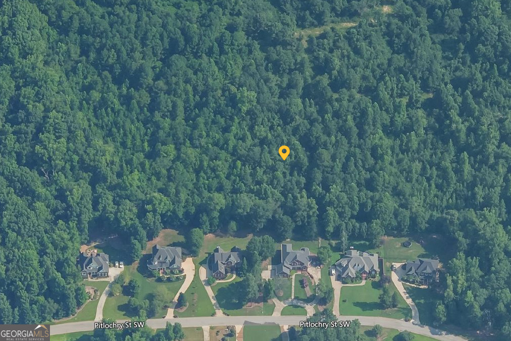 Explore an exceptional investment or development opportunity in one of Rockdale County's most sought-after residential neighborhoods. This sprawling parcel of land is a blank canvas, awaiting transformation into a distinguished residential enclave, an engaging leisure destination, or your personalized sanctuary away from the hustle and bustle. With nearly limitless potential, the property is ideally situated less than 4 miles from Interstate 20, with convenient access to Highway 138 and GA State Hwy 212, placing it in a fast-developing area known for its superior schools and community amenities. This prime real estate offering is positioned to capitalize on the growth and development in the region. Its strategic location ensures easy access to major transportation routes, making it a highly desirable site for potential residents or businesses. Whether you're looking to develop high-quality residential homes, a unique recreational facility, or simply secure a serene spot for personal enjoyment, this property provides the perfect foundation. Available for viewing at your convenience with no appointment necessary, this land invites you to explore its potential and envision the future. Don't let this unparalleled opportunity pass by. Come and discover why this property is an ideal investment for those looking to make a significant impact in Rockdale County.