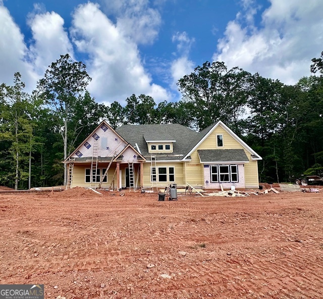 Looking for a STEPLESS RANCH in Southern Coweta County? The beautiful Birch Creek plan offers great curb appeal leading into foyer entry. You'll appreciate the open concept, with Kitchen / Dining / Family offering open flow, but separation enough to entertain a large crowd! The Family Room features trey ceiling w/coffer detail, wood-burning fireplace w/stone or brick hearth, and windows for natural light! The Kitchen boasts tasteful cabinets topped with quartz or granite tops, designer tiled backsplash, and stainless appliances including backless slide in range/oven, micro-hood, and dishwasher. The attached Dining Area features ample space for entertaining and doors leading to covered rear patio. The Owner's Suite is nicely sized and features coffered ceiling, luxurious tiled bathroom with dual vanity, and spacious walk-in closet connecting to Laundry Room for convenience. Two guest rooms are found on the opposite side of the home with a shared bathroom. An additional guest bedroom and bath is found off the foyer. This home features SPRAY FOAM INSULATED ATTIC, low maintenance Hardi-Plank siding, Architectural Shingles, and SMART HOME TECHNOLOGY PACKAGE! Receive up to $6,000 toward buyer's closing costs when using on of the builder's preferred lenders!