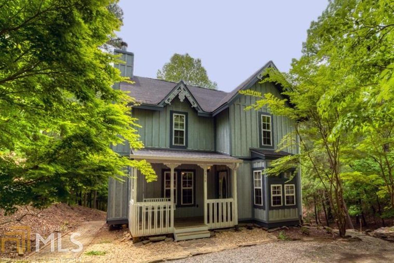 Adorable mountain cottage in the sought after Coossawattee River Resort community. 3 beds/2.5 baths with a master on main. French doors open to private wooded deck. Wonderful floor plan with plenty of room for an active household or quiet relaxing. Large eat in island with freshly painted cabinets and SS appliances. Large additional cubby space in second bedroom upstairs, perfect workroom or office with a window. Well maintained, new roof, private lot on almost 1 acre.