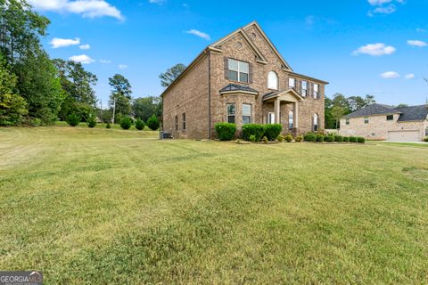 Photo of 1548 Harlequin Way, Stockbridge, GA 30281 (MLS # 10618480)
