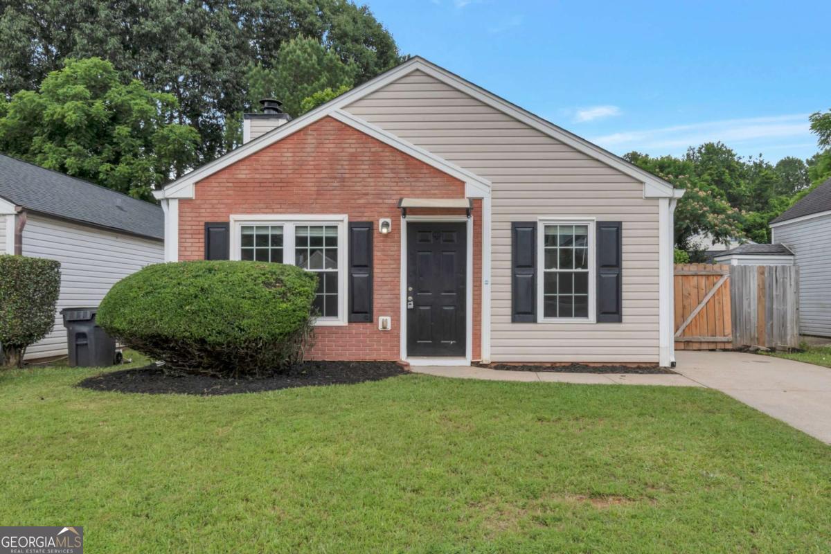 Perfect location and move-in ready! NO HOA! Fresh paint! Fresh appliances! Granite counters throughout! This lovely 2-bedroom in Lawrenceville offers great commuting options to get into Atlanta! Work from home? The large living space can easily accommodate a workstation! Beautiful new sliding door to private, fenced yard if you prefer the solace of solitude, and a large patio has the makings for your next shindig. Flat yard, this is a great home if you have a pet, easy to clean with all hard surfaces! Ready for your showing today!