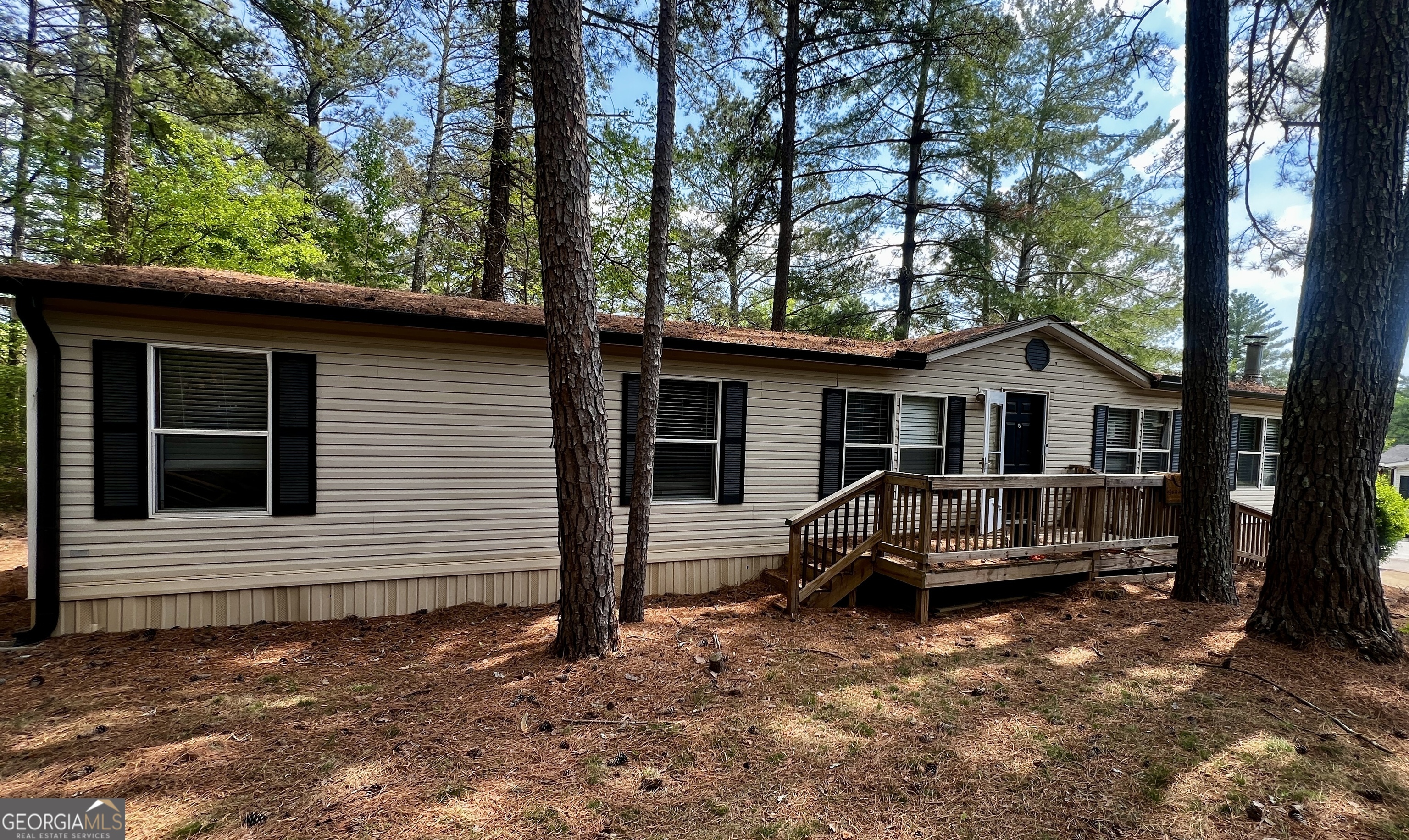 Newly renovated 3 bedroom, 2 bathroom, double-wide mobile home located in the Countryside Village of Gwinnett. Conveniently located near Mall of Georgia. This home offers a very spacious open concept. Fully equipped eat-in kitchen includes granite countertops, stainless steel appliances. Beautiful new flooring, new bathrooms, newly installed ceiling fans and light fixers, separate living room and dining area. Nice Community with pool, Gym, playground and meeting room.Mobile home is located on a leased lot and subject to the terms of the lot lease. Application must be completed with the onsite leasing office. Lot fee currently $803/ mo. Great opportunity for investment! Prior to submitting an offer, Buyer and buyer's agent should verify all information in this listing, including but not limited to school information, taxes, lease information. The home could be moved with 90 day notice to the community. Renting is allowed as long as all involved pass background check. **Land cannot be purchased**