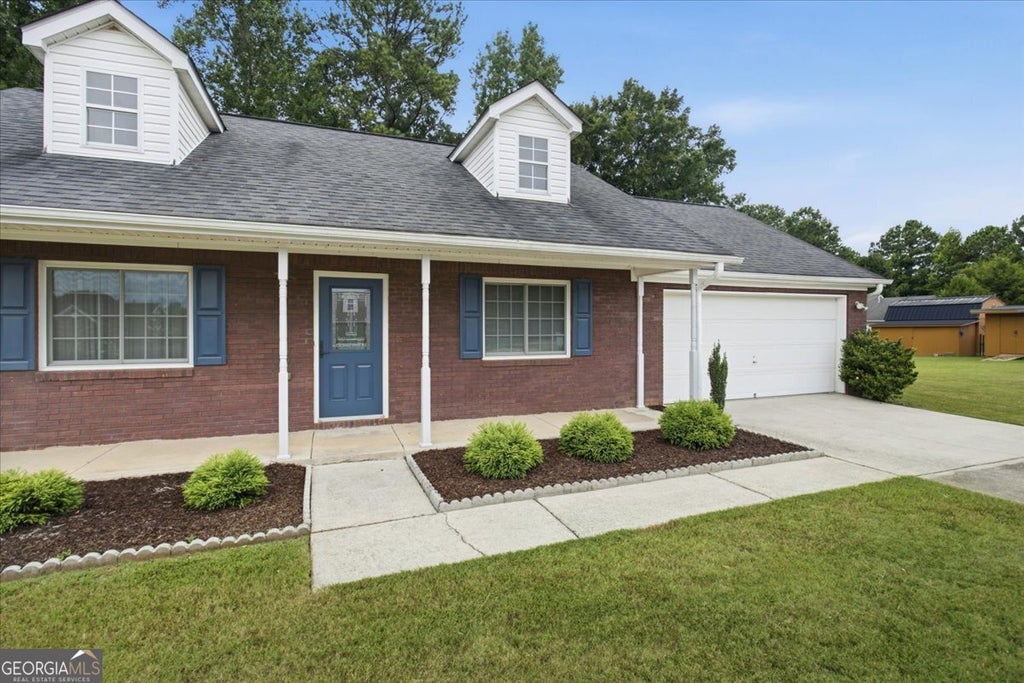Photo of 104 Elmwood Drive, Hampton, GA 30228 (MLS # 10804344)