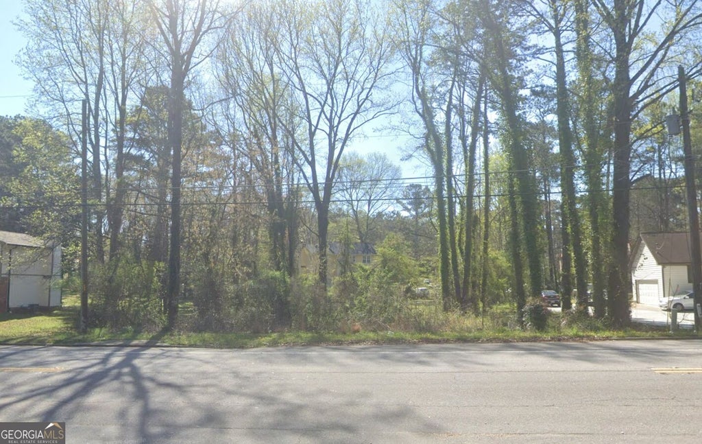 Photo of 7826 Fielder Road, Jonesboro, GA 30236 (MLS # 10847210)