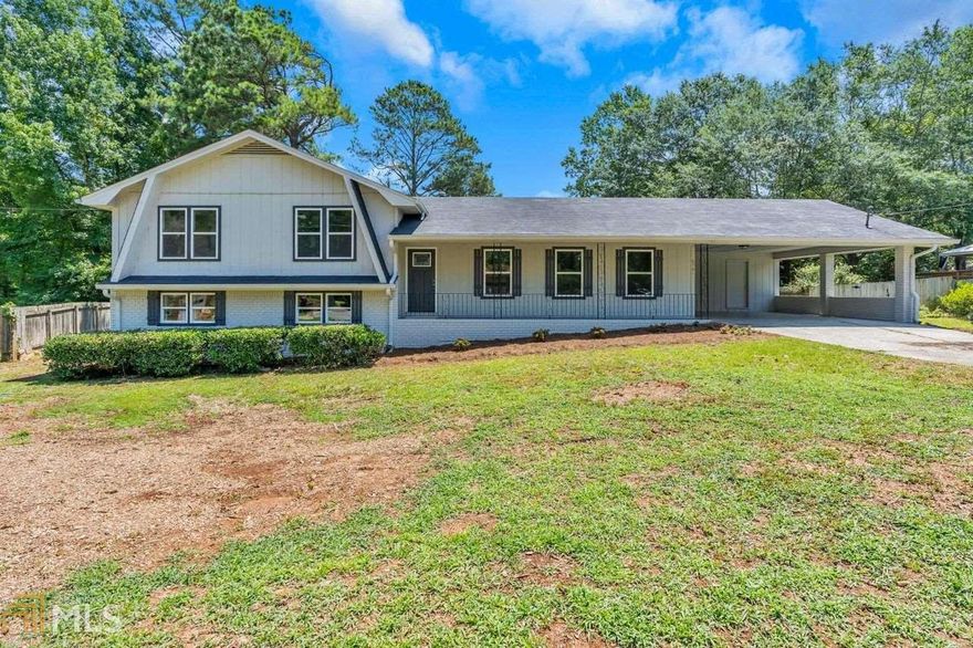 Completely remodeled 4 sided brick home with lots of upgrades! Brand NEW ROOF! Fresh interior and exterior paint, new doors and windows, elegant crown molding and trims throughout main living areas. Original masonry fireplace, new kitchen cabinets with soft close feature, granite countertops and subway tiles, SS appliances, LVT throughout main and carpets in bedrooms. This home has lots of natural light and very open. It is move in ready, hurry!
