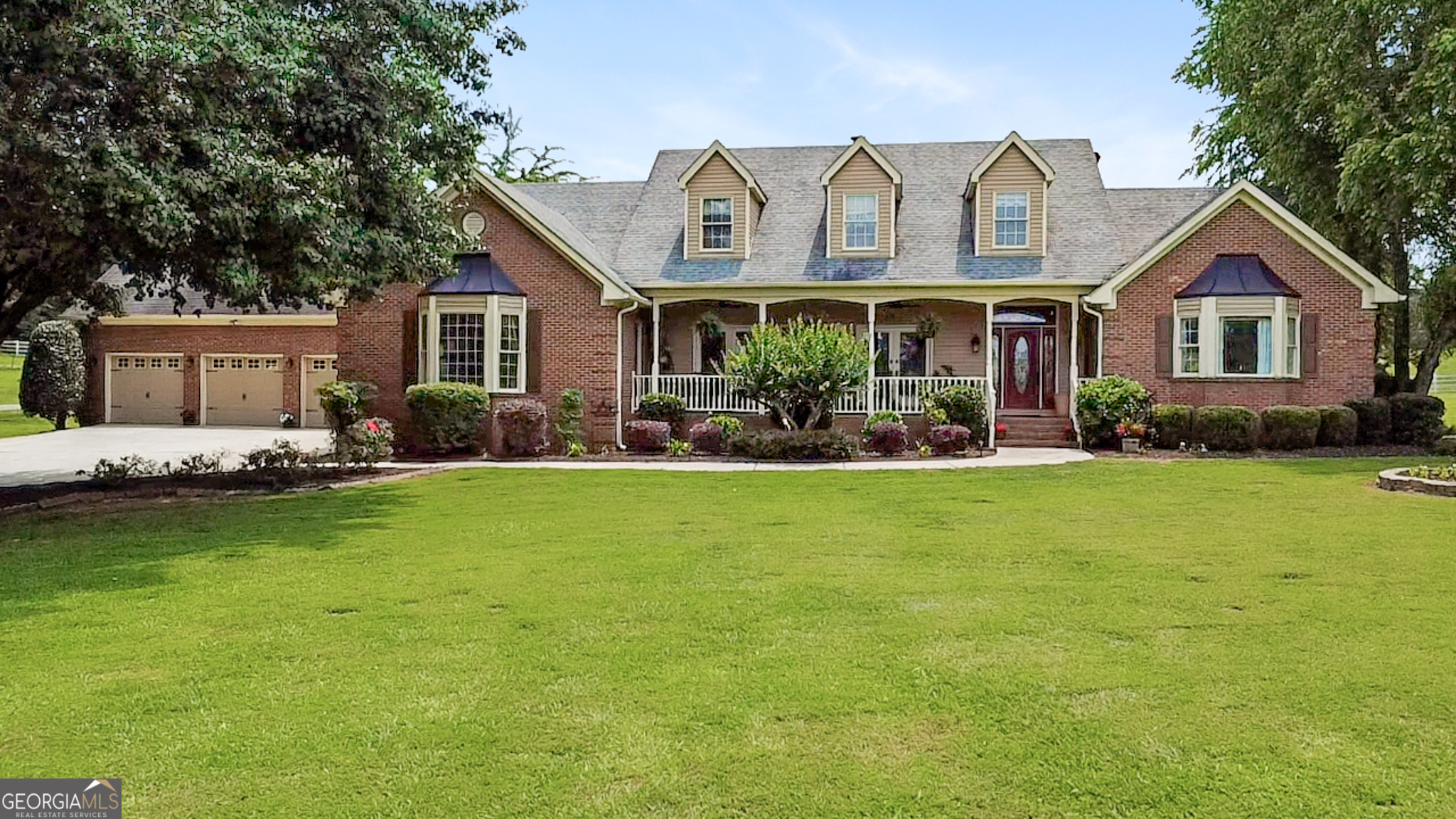 This nearly 50-acre estate boasts serene, private land featuring numerous pastures, a lake, and scenic views. The gourmet kitchen and remodeled bathrooms offer stylish high-end finishes and appliances. Other features include a formal living and dining room, keeping room, half bath, laundry room and an office. The master suite, conveniently located on the main level, offers breathtaking views of the lake, creating a peaceful, private retreat. The 2nd level includes an updated bath with tiled walk in shower, 2 bedrooms and plenty of attic space for storage. Off to one end of the main floor is a fully-equipped attached apartment with its own entrance, offering privacy and versatility-ideal for guests, in-laws, or even potential rental income. Out back, a spacious deck invites you to entertain or simply unwind. The in-ground pool offers a perfect space for lounging or hosting poolside gatherings. Equestrians will love the stable with 8 stalls providing ample space for horses. Set in a quiet, secluded location, this estate combines luxury living with a rural feel, offering something for everyone. Whether you're a nature enthusiast, an equestrian, or someone who values peace and quiet, this home is a must see.