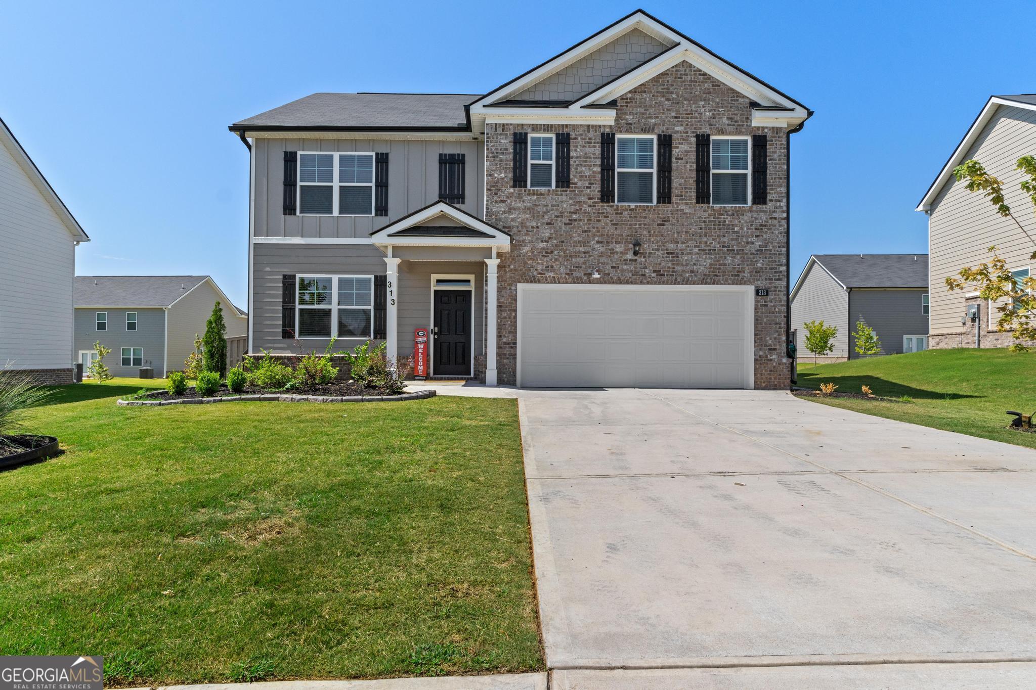 Welcome to this stunning 2024-built two-story home located in the highly sought-after Cedar Ridge subdivision in Henry County, with access to the desirable Locust Grove school district. With only one owner, this immaculate 5 bedroom, 3 bathroom home blends modern style with thoughtful functionality. Step inside to find an inviting open floorplan on the main level, where the foyer opens to a cozy den area on your left-perfect for a home office or sitting room. The spacious family room flows seamlessly into the kitchen, which features granite countertops, a breakfast bar, pantry, and a direct view into the living area, ideal for entertaining. A guest bedroom and full bath on the main level offer convenient accommodations for visitors. Upstairs, you'll find four additional bedrooms, including an oversized primary suite complete with a walk-in closet and a luxurious en suite bath featuring double vanities, a soaking tub, and a separate shower. The three secondary bedrooms are generously sized and share a full hall bath, perfect for family, guests, or use as flex spaces. A full laundry room is also located on the upper level for added convenience. Outside, enjoy the privacy of a fully fenced backyard with a screened-in back patio and charming pergola-an ideal retreat for relaxing or entertaining. A front-facing two-car garage adds convenience and curb appeal. Residents of Cedar Ridge enjoy community amenities including a pool and playground, making this home an ideal choice for families. Don't miss your opportunity to own this nearly-new gem in a prime location!