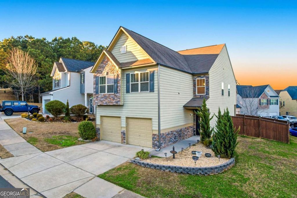 Photo of 4068 Lake Manor Way, Atlanta, GA 30349 (MLS # 10676411)