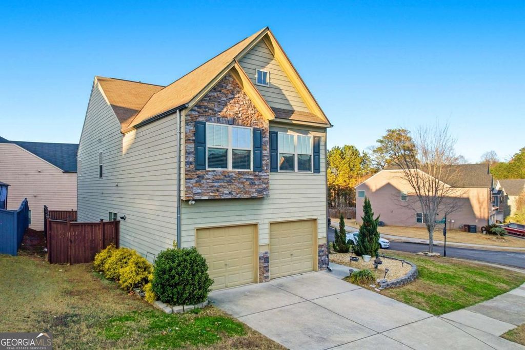 Photo of 4068 Lake Manor Way, Atlanta, GA 30349 (MLS # 10676411)