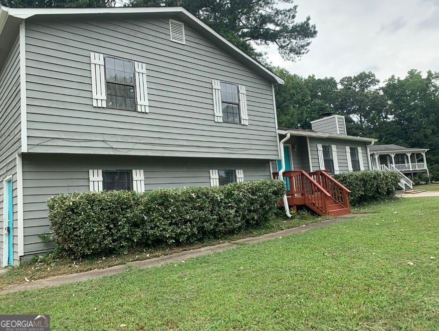 Located in the highly sought-after Horseshoe Bend neighborhood!  This is a perfect opportunity for savvy homebuyers looking to add their personal touch - or for investors seeking their next project. Whether you're planning a fix-and-flip or a long-term hold, this rare find is one you don't want to miss.  No HOA. No rent restrictions. Just a little TLC and this home will truly shine!    The property features a functional layout with 4 spacious bedrooms, ceramic tile floors in the kitchen and bathrooms, a lovely hardwood deck, and a finished basement.    Conveniently located with easy access to Barrett Parkway, Powder Springs Road, and just minutes from I-20.