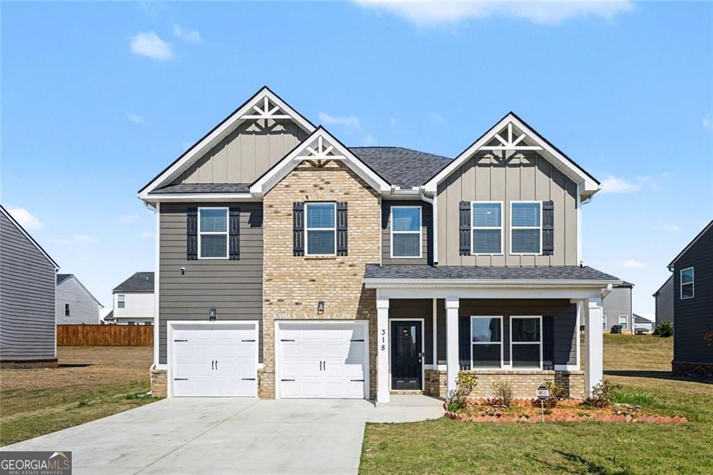 Photo of 318 W Sandy Creek Drive, Covington, GA 30014 (MLS # 10758476)