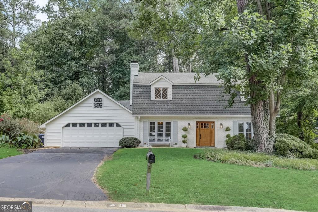 You're not going to want to miss this recently RENOVATED 4-bedroom home on a large level lot with a WALKOUT BACKYARD and a POOL in the heart of East Cobb! With an open layout and an efficient use of space, it's the perfect place to call home. You'll immediately notice the charm of this home with custom millwork and wide plank hardwood flooring throughout (no carpet!) The large chef's kitchen has an abundance of natural light and boasts custom cabinetry, a quartzite countertop, a farm sink, a Viking oven with 6 burner gas cooktop, counter seating, and an eat-in banquette style breakfast area. The main floor also offers a large banquet sized dining room, and a spacious family room with wood burning fireplace and built-in shelves. Upstairs is the primary suite with a private bath plus three additional generously sized bedrooms and one additional bathroom plus a small loft which can serve as a library or study area. The private fenced backyard offers resort style living with an extremely well-maintained PRIVATE POOL and a HOT TUB, plus plenty of space for grilling, or playing lawn games with family and friends. Within walking distance is nearby Hyde Farm and right beyond the park is the access point to the trails that are part of the Chattahoochee National Forest Park system. This home is truly move-in ready with all systems relatively newer - brand new HVAC, new electrical and plumbing, low flow toilets, Nest thermostat, and 2020 water heater. Seller willing to leave refrigerator and washer/dryer. Located in the heavily sought out Sope Creek Elementary and Walton High school districts, you'll be hard pressed to find a better home.