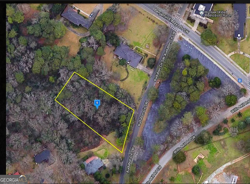 Prime Buildable Lot in SW Atlanta - 0.81 Acres! Tucked away in a quiet residential enclave near Cascade, this expansive 0.81-acre lot offers the perfect opportunity to build your dream home or next investment property. Surrounded by mature trees and well-maintained homes, the site boasts a serene setting with the convenience of city living. Just minutes from downtown Atlanta, BeltLine access, and Tyler Perry Studios, the location is ideal for developers or buyers seeking privacy without sacrificing accessibility. Utilities available nearby. Zoned residential and primed for development. Don't miss your chance to claim this rare, oversized lot in a growing area of Southwest Atlanta