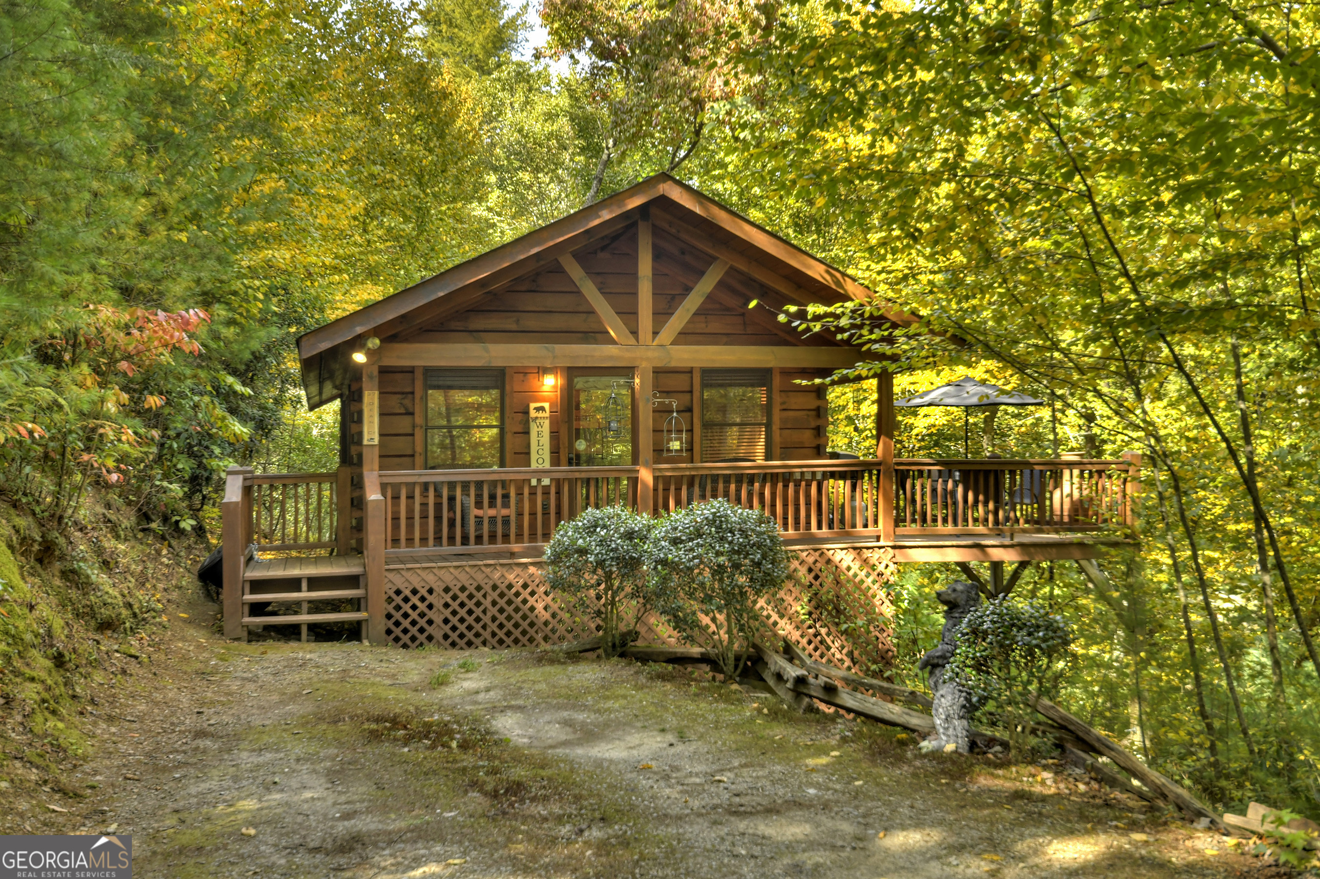 Charming and cozy one bedroom and one bathroom cabin nestled in the heart of Blue Ridge! The cabin's one level living provides a warm and inviting atmosphere complete with a rock fireplace and wood floors throughout. Outside you will find plenty of deck space to enjoy the seasonal mountain views and unwind. Located conveniently between both Ellijay and Blue Ridge, there are plenty of options for dining, shopping and all the outdoor entertainment North Georgia has to offer. Whether you are seeking your own private retreat or an investment opportunity, look no further!