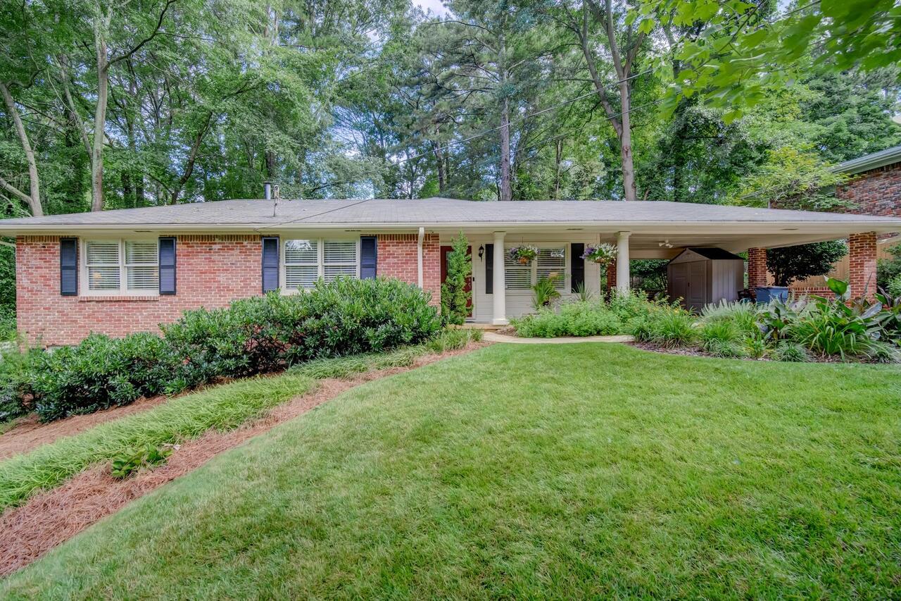 Don't miss out on this charming home in the heart of Tucker! In a quiet, quaint neighborhood with quick access to 285/85 restaurants and shopping and no HOA! This 4-sided brick home has been lovingly maintained and features original hardwoods, tons of natural light and neutral paint throughout! It features two good sized bedrooms and bathrooms. The primary bedroom has an enormous walk-in closet and ensuite with separate tub/shower and updated vanity! The renovated hall bath features subway tile and beautiful carrera marble floors! This home has a large kitchen with tons of storage and countertop space, great for prepping meals or entertaining! Walk right out the back door to the gardeners oasis! Sitting on an enormous, private wooded lot you can enjoy the birds chirping under the shade of the trees! Its a truly beautiful space! This ranch sits on a basement- plenty of room for storage, an office space, playroom, man cave or more!