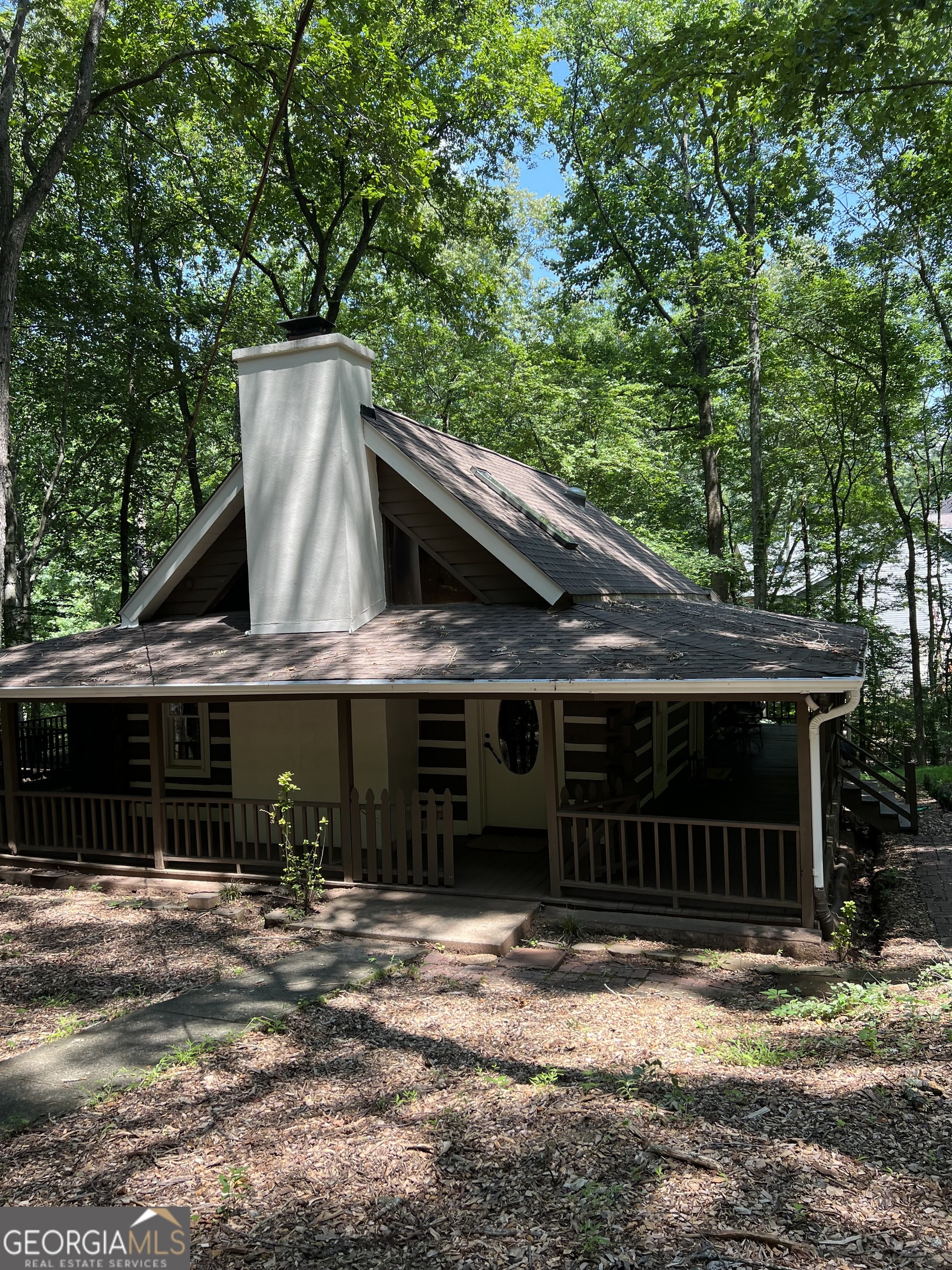 Welcome to 2071 Vicki Lane, Cumming, GA! Charming 2-bedroom, 1-bath cabin on 5 private acres offering the perfect blend of rustic charm and modern comfort. This 2,055 sq. ft. home features a spacious open floor plan with natural wood accents, abundant natural light, and inviting living spaces. Enjoy peaceful country living while being just minutes from GA-400, shopping centers, restaurants, parks, and top-rated schools. The property offers plenty of space for outdoor entertaining, gardening, or potential expansion. Currently operating as a successful Airbnb, this home presents an excellent investment opportunity or the ideal private retreat. Whether you're looking for a weekend getaway, income-producing property, or a place to call home, this unique cabin has endless possibilities. Don't miss this rare opportunity! Contact the listing agent today to schedule your private showing.